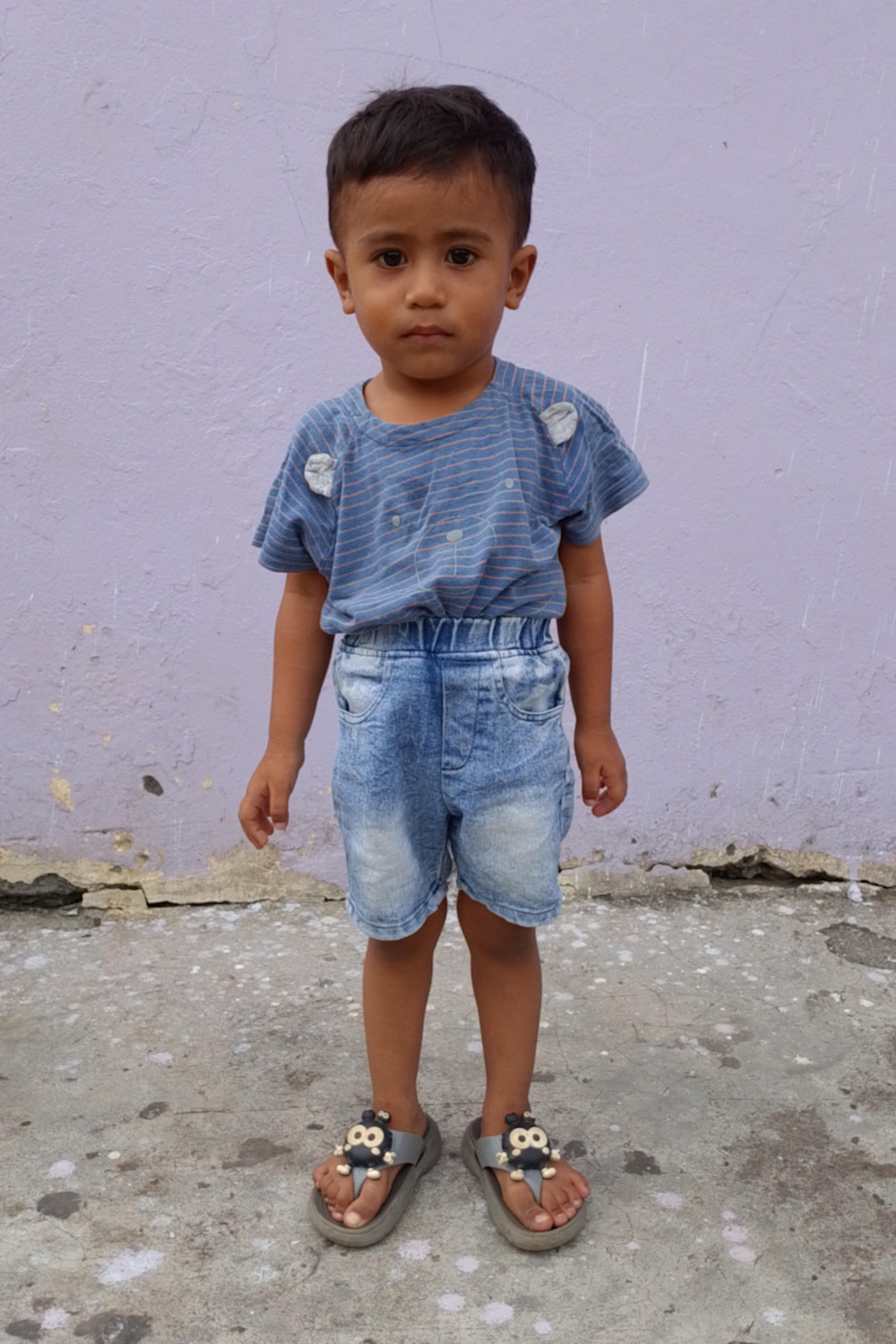 An unsponsored boy named Kemal from Indonesia who has waited 437 days for a sponsor.