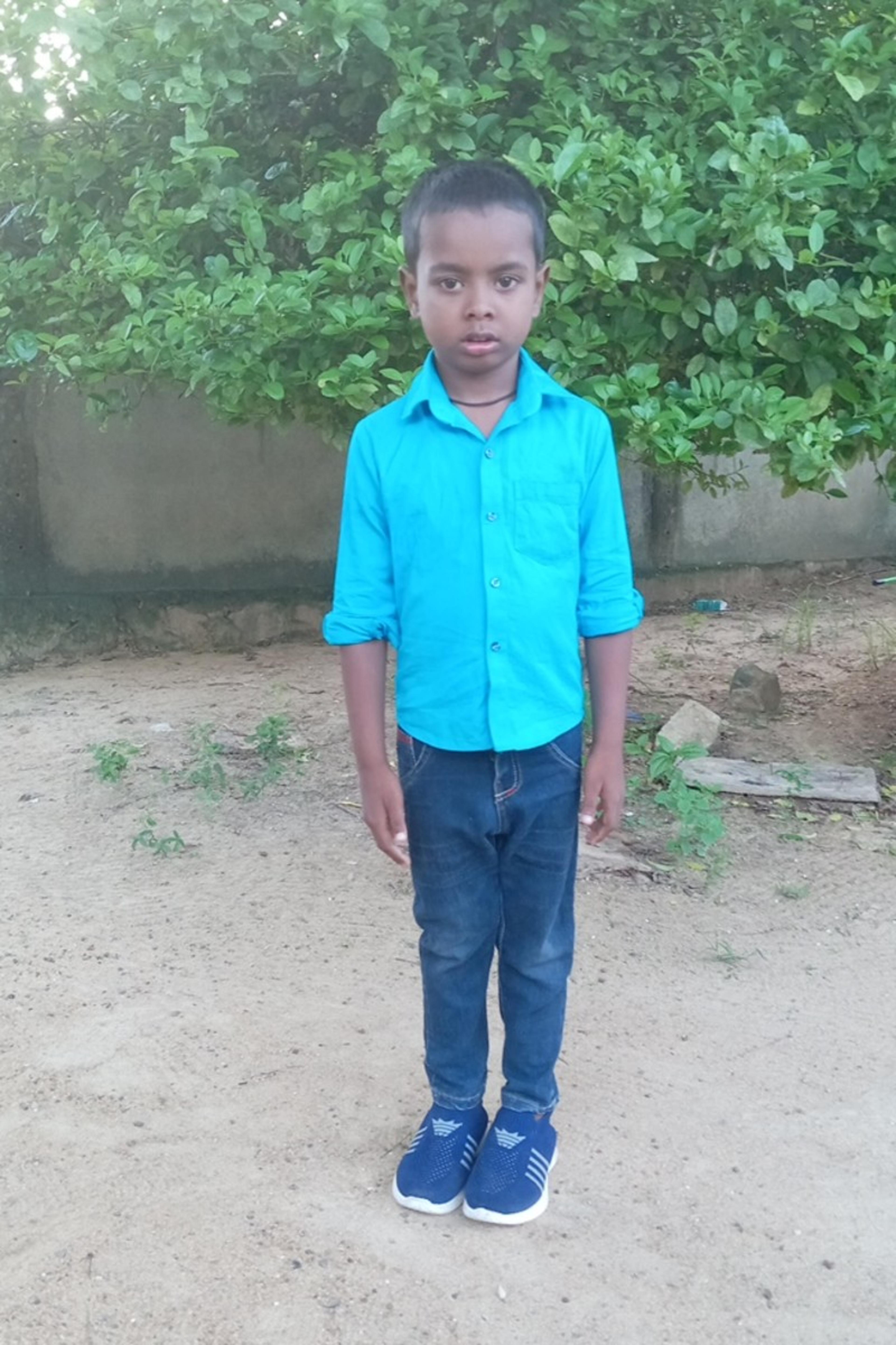 An unsponsored boy named Thuvi from Sri Lanka who has waited 625 days for a sponsor.