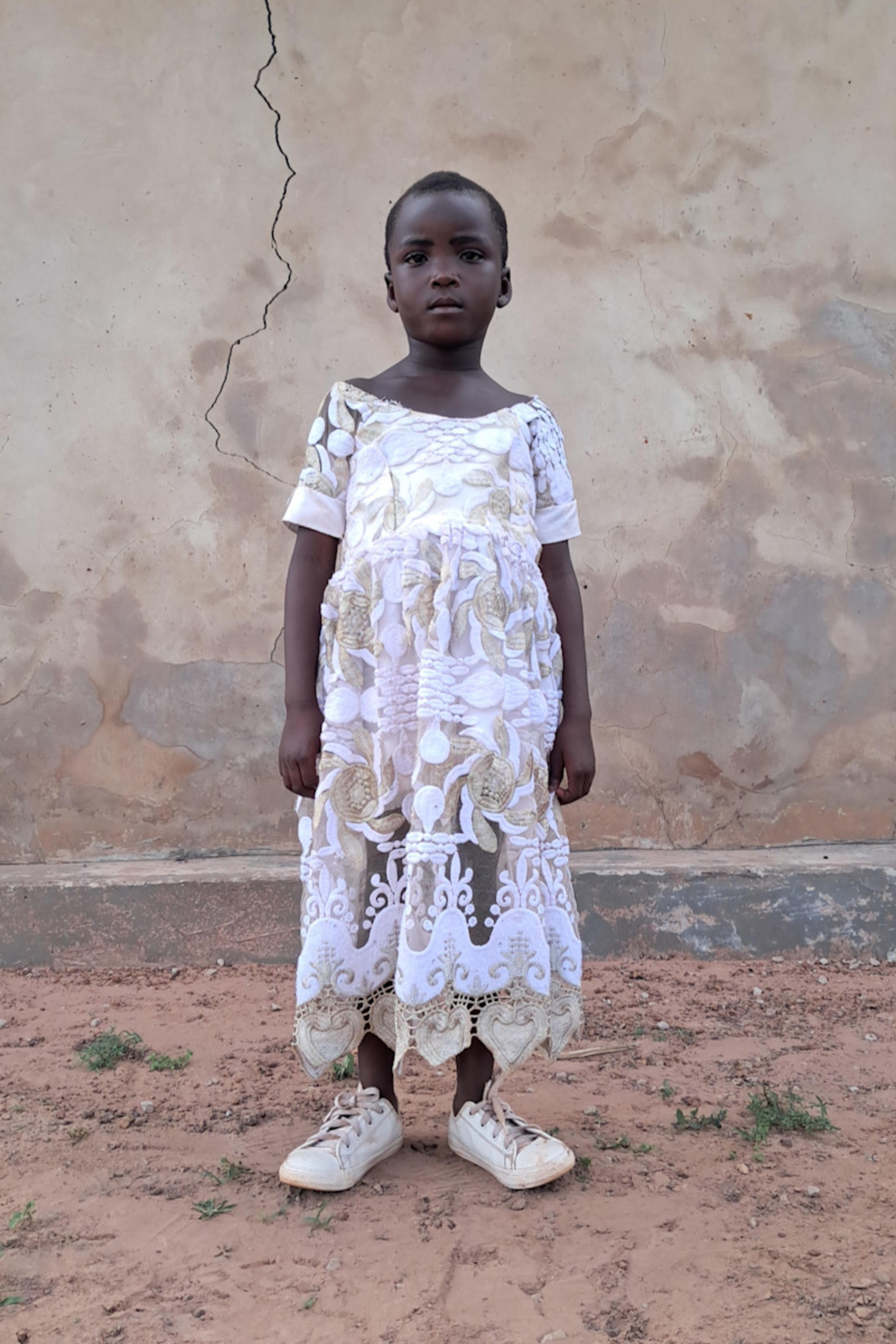 An unsponsored girl named Osla from Ghana who lives in an AIDS-affected area and has waited 322 days for a sponsor.