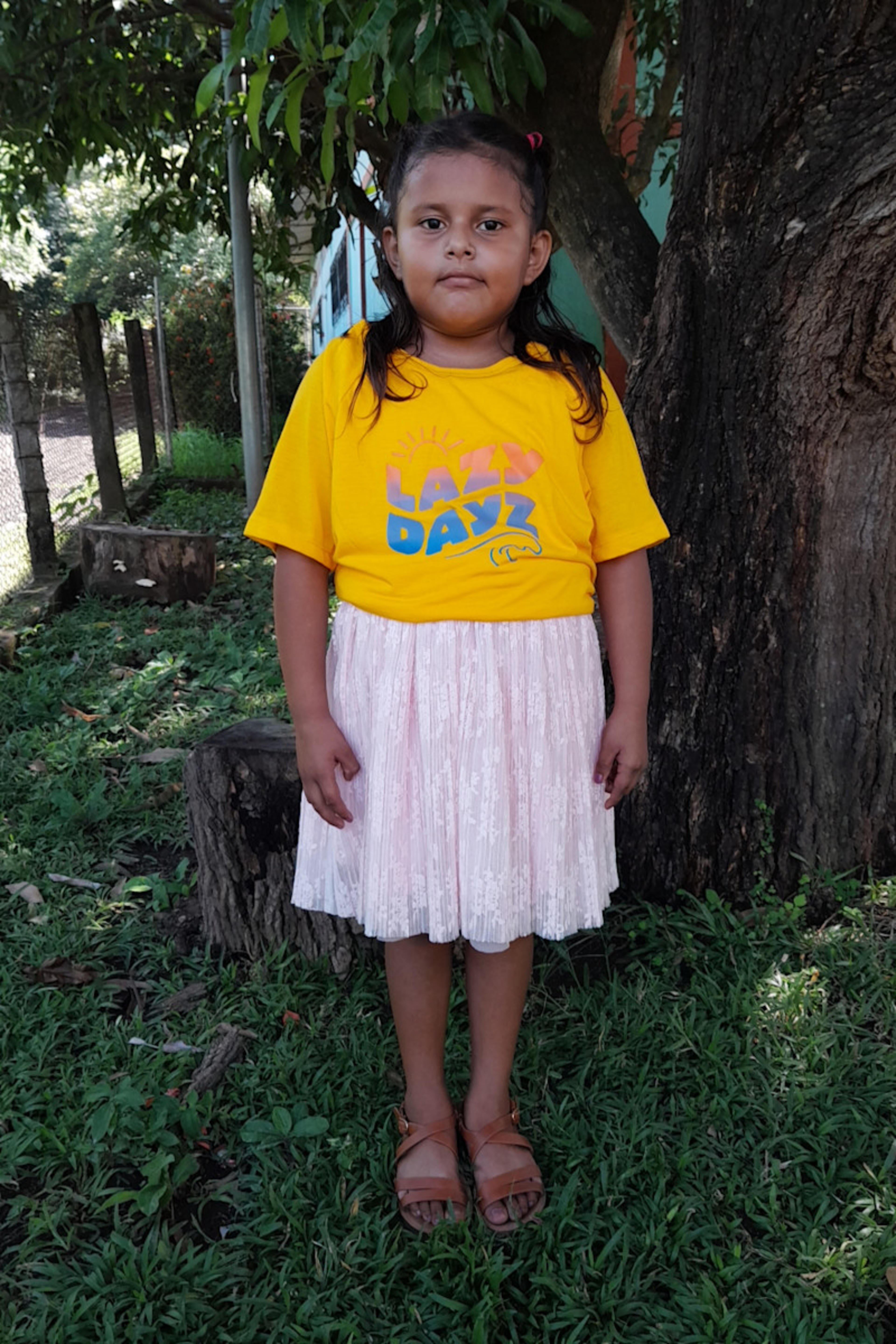 An unsponsored girl named Estela from El Salvador who has waited 298 days for a sponsor.