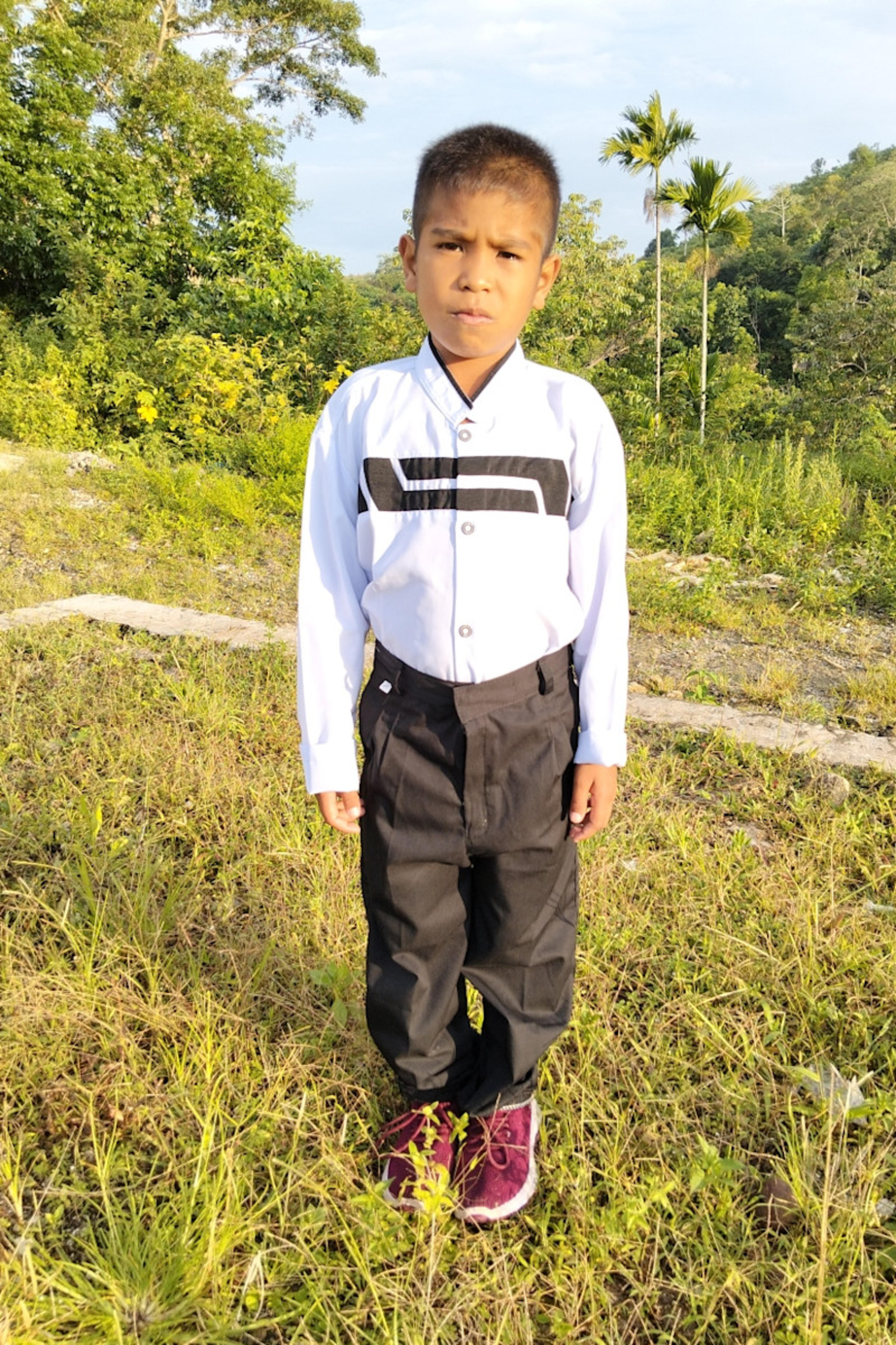 An unsponsored boy named Rikho from Indonesia who has waited 615 days for a sponsor.