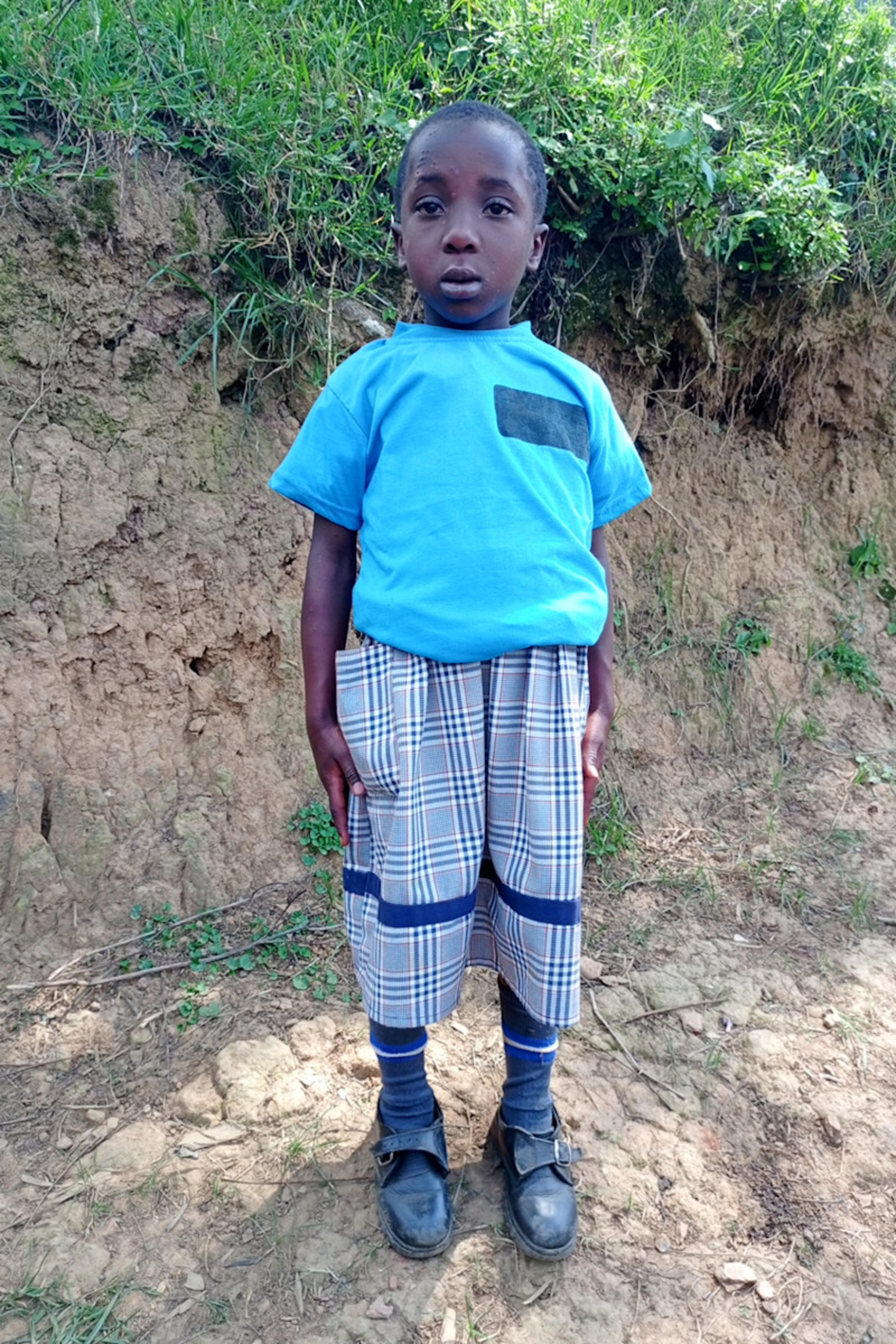 An unsponsored girl named Megan from Uganda who lives in an AIDS-affected area, is vulnerable to exploitation and has waited 436 days for a sponsor.