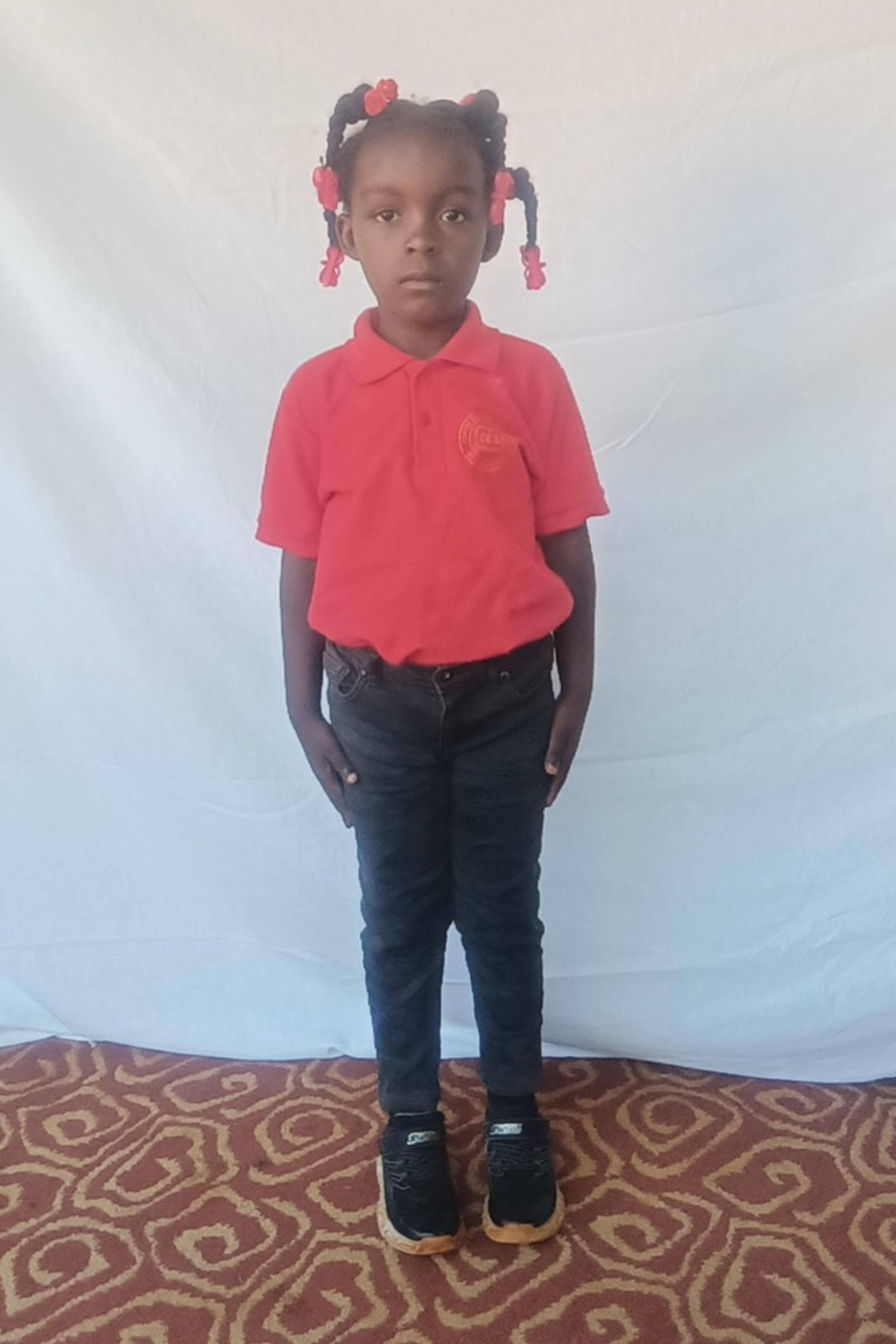 An unsponsored girl named Enolicia from Haiti who is vulnerable to exploitation and has waited 276 days for a sponsor.