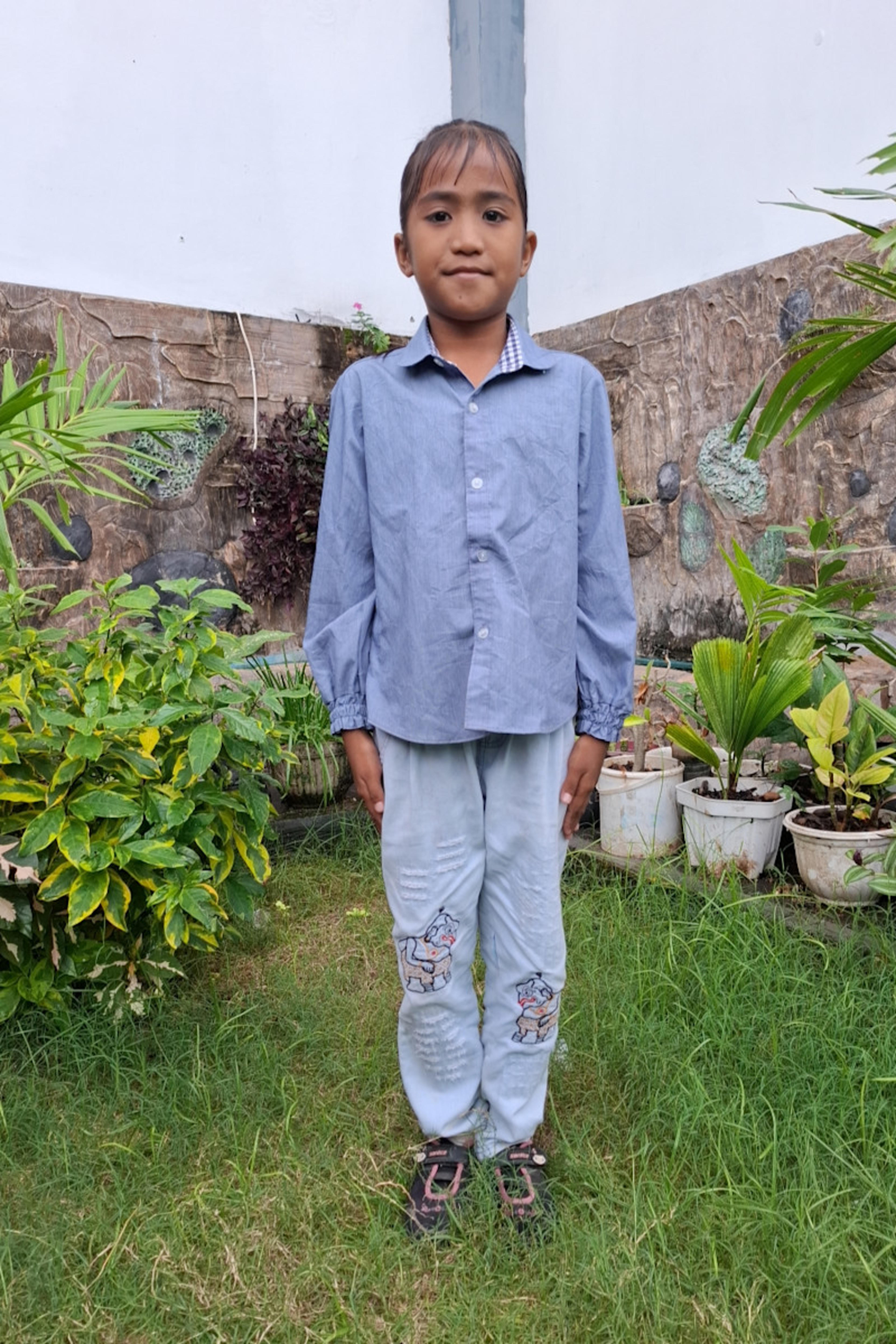 An unsponsored girl named Yeni from Indonesia who has waited 445 days for a sponsor.