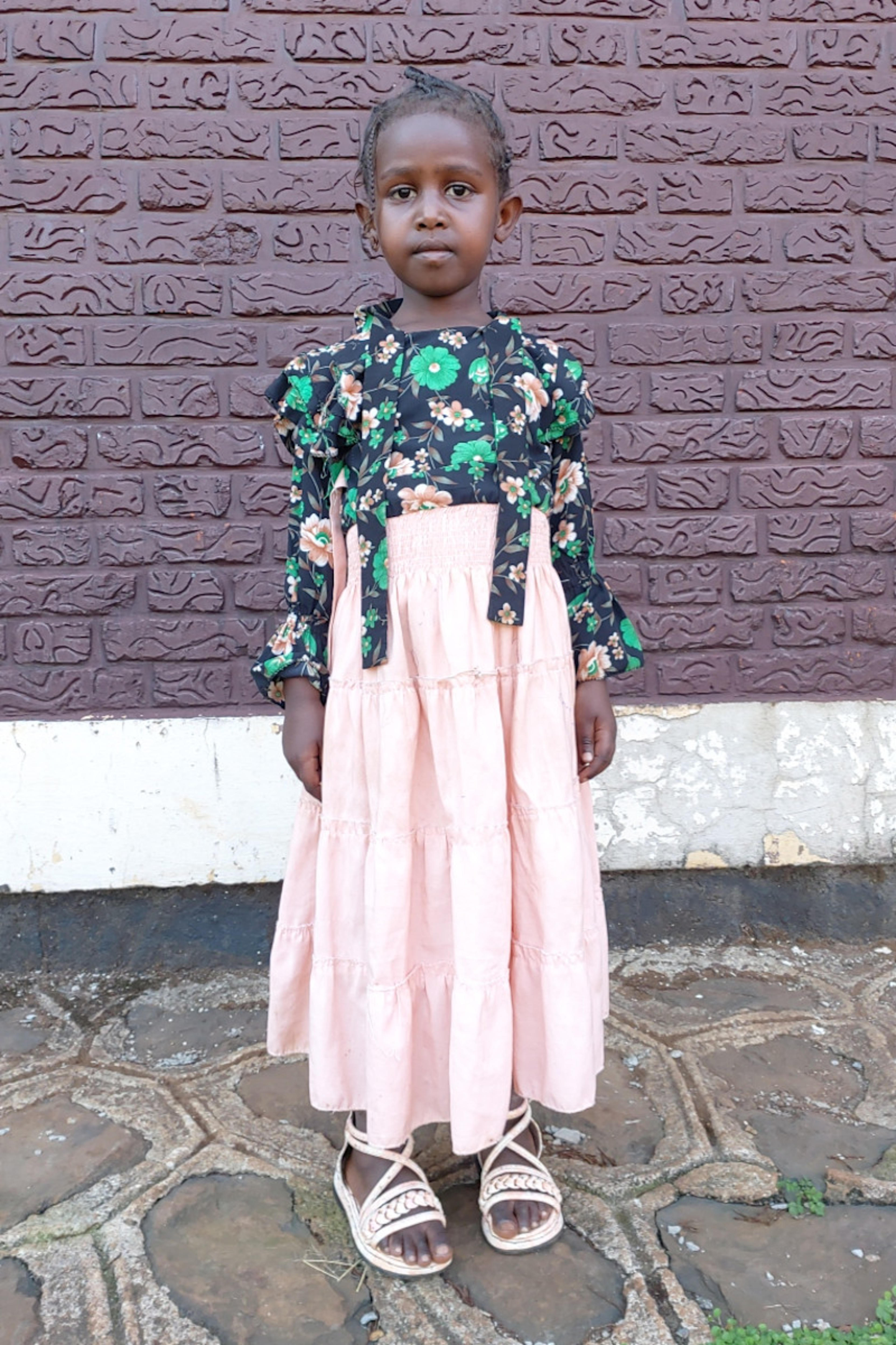 An unsponsored girl named Mihiret from Ethiopia who lives in an AIDS-affected area, is vulnerable to exploitation and has waited 228 days for a sponsor.