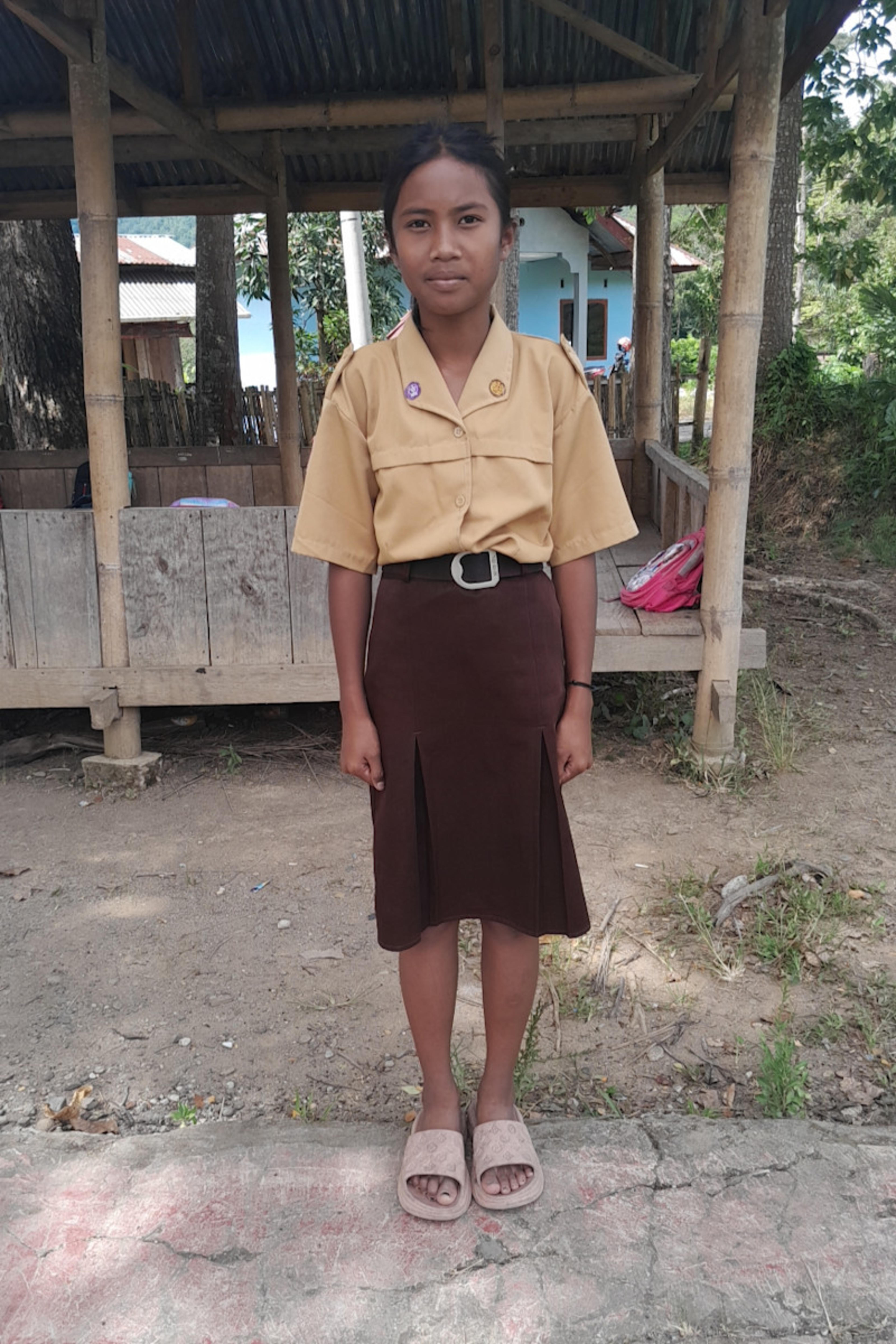 An unsponsored girl named Iren from Indonesia who has waited 353 days for a sponsor.