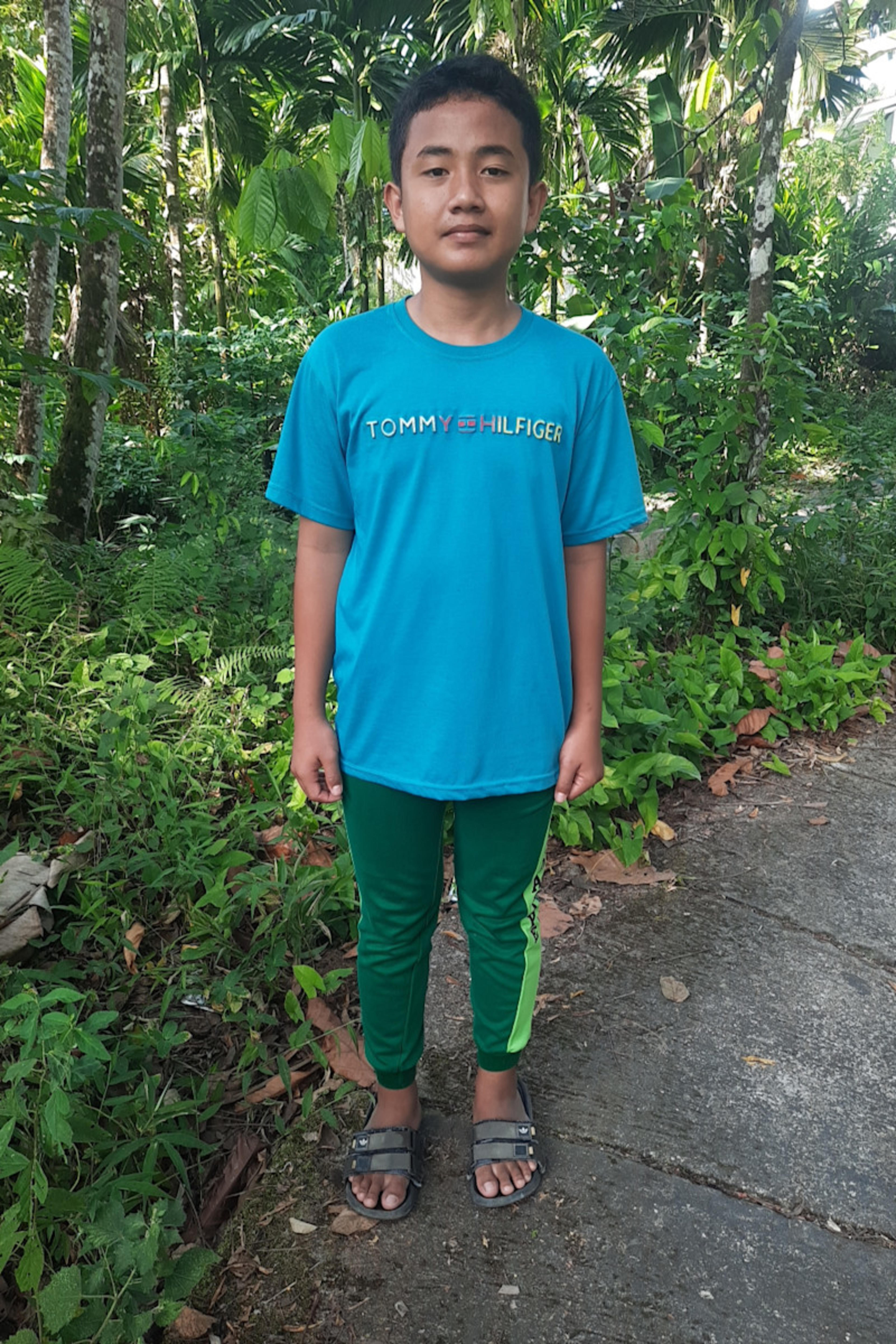 An unsponsored boy named Dado from Indonesia who has waited 706 days for a sponsor.