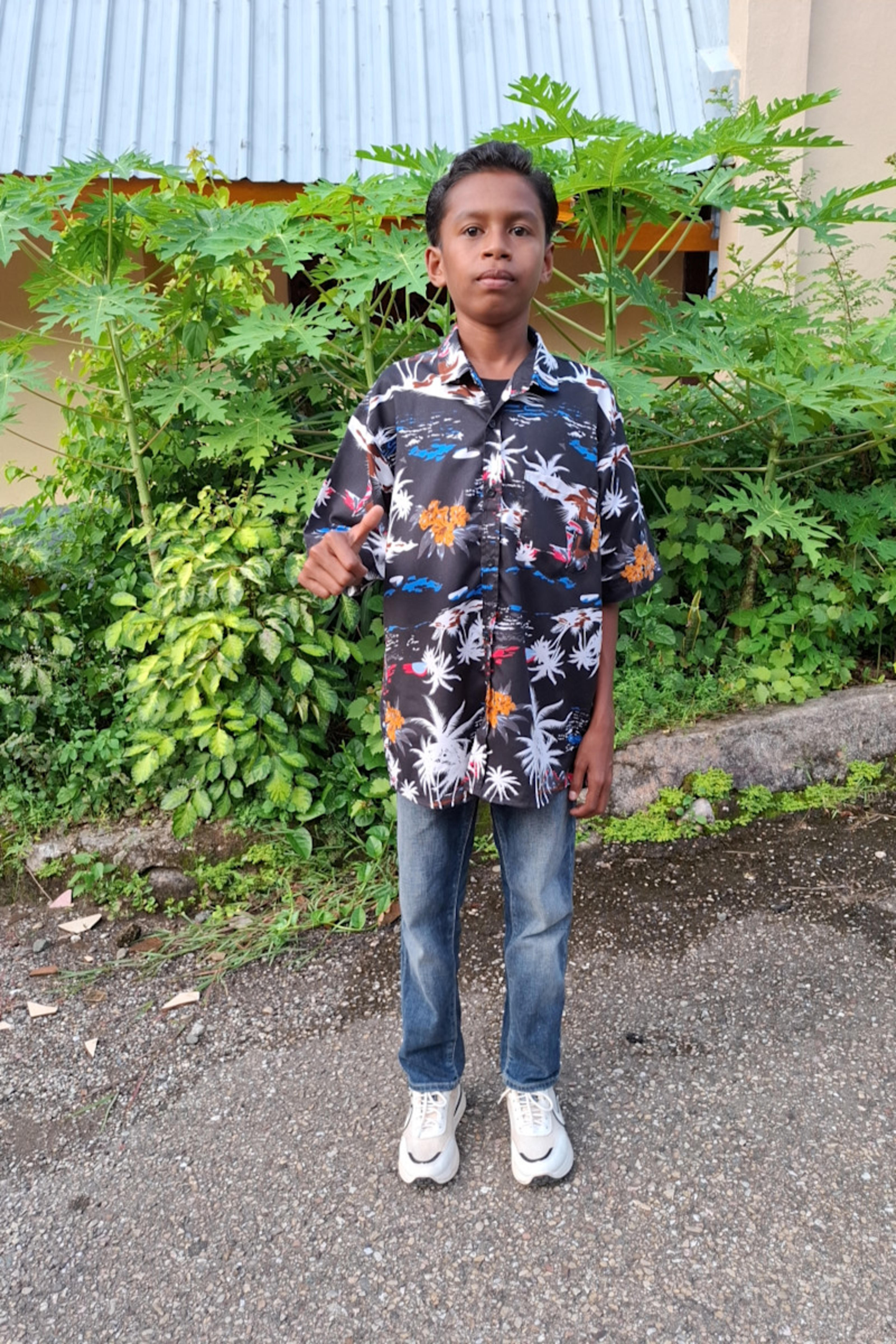 An unsponsored boy named Firli from Indonesia who has waited 528 days for a sponsor.