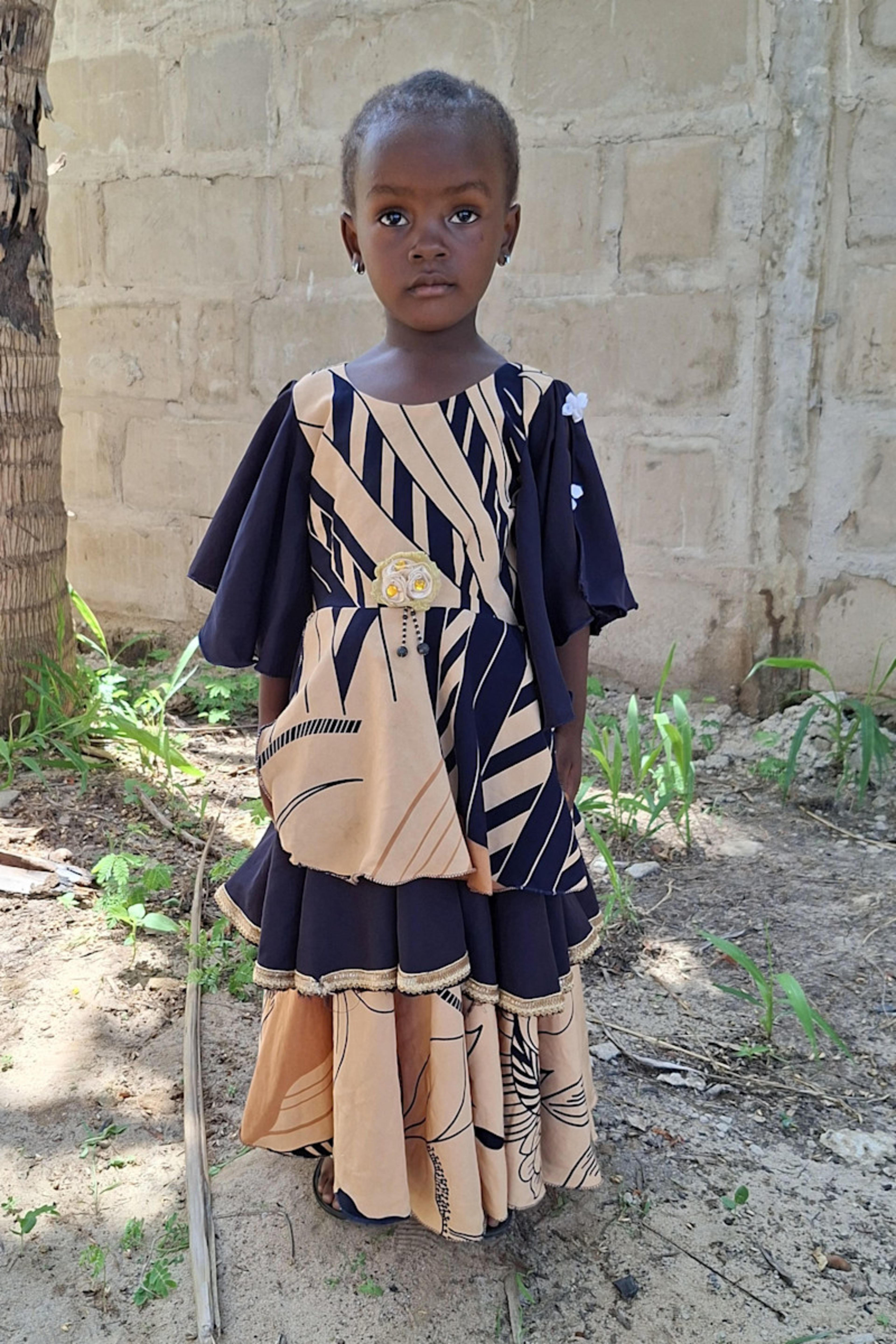 An unsponsored girl named Careen from Tanzania who lives in an AIDS-affected area, is vulnerable to exploitation and has waited 204 days for a sponsor.