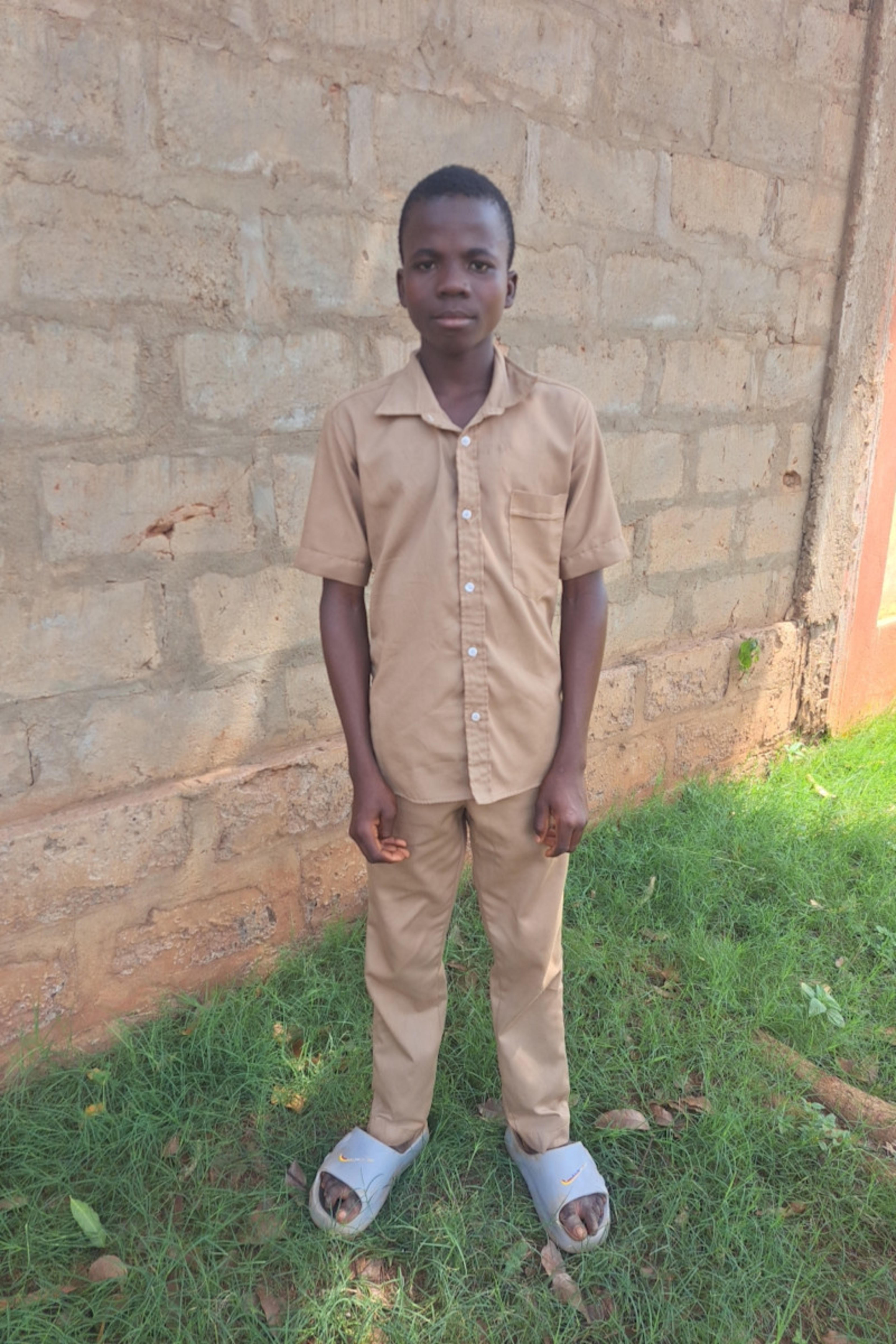 An unsponsored boy named Selom from Togo who lives in an AIDS-affected area, is vulnerable to exploitation and has waited 547 days for a sponsor.