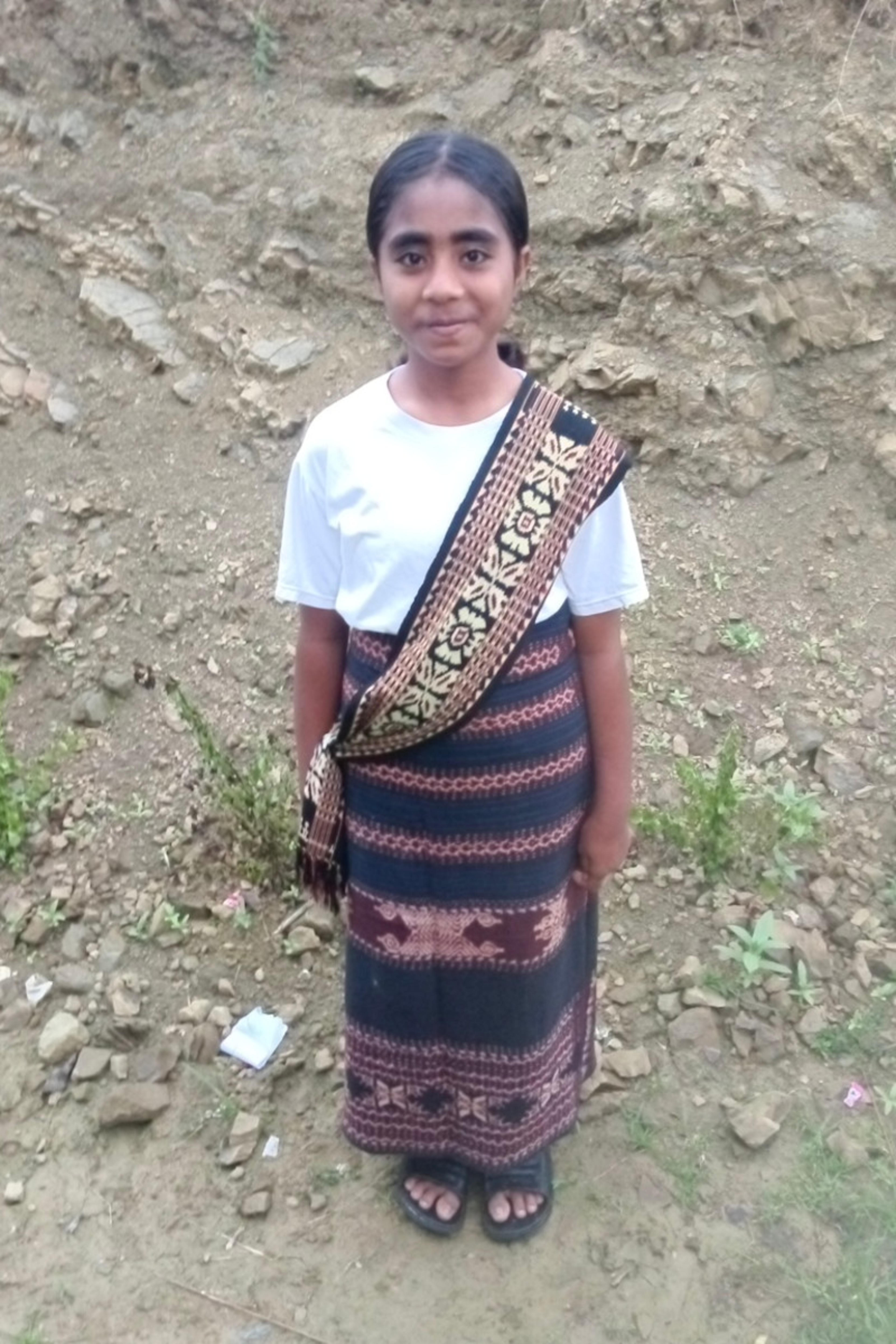An unsponsored girl named Gress from Indonesia who has waited 104 days for a sponsor.