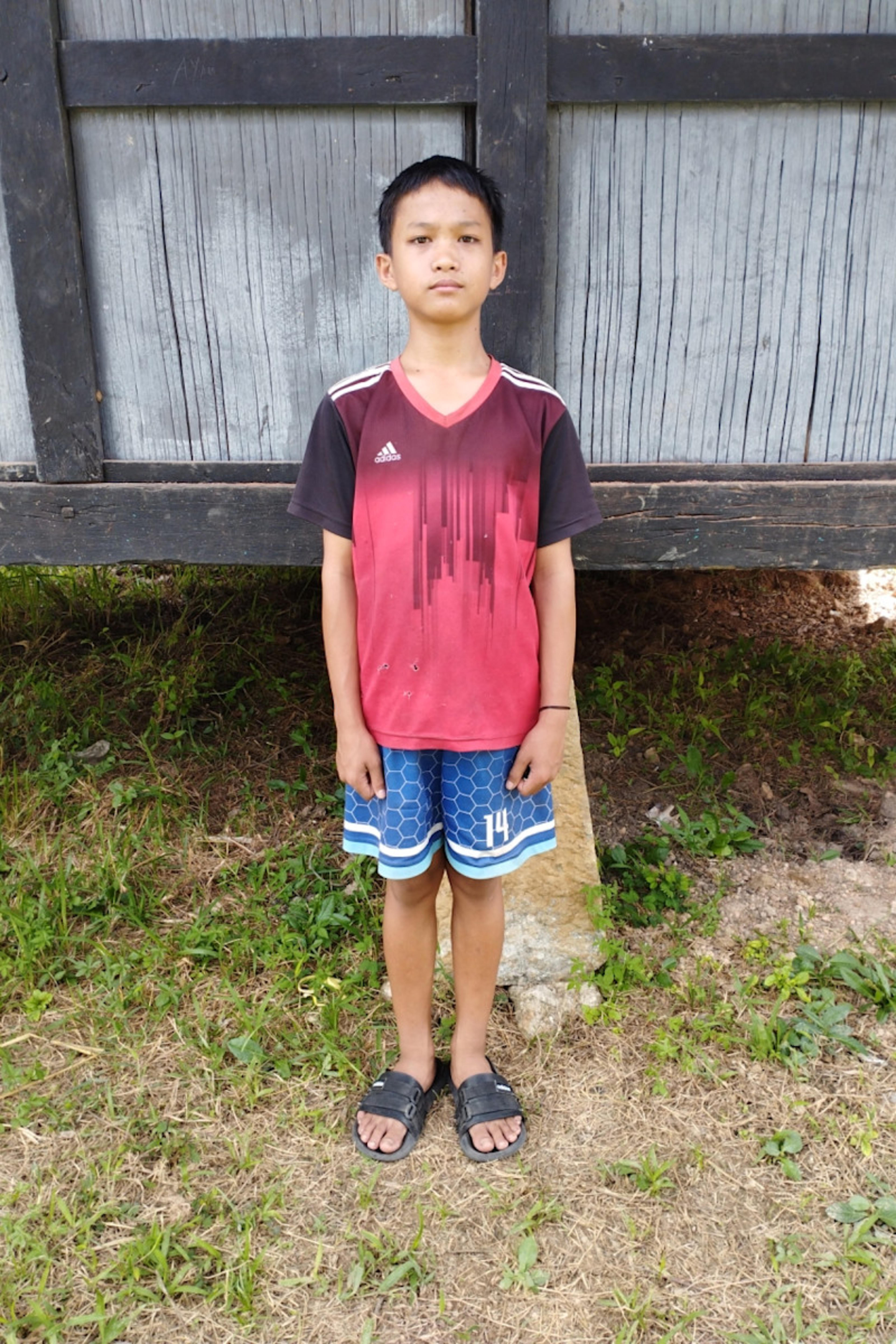 An unsponsored boy named Agung from Indonesia who has waited 678 days for a sponsor.