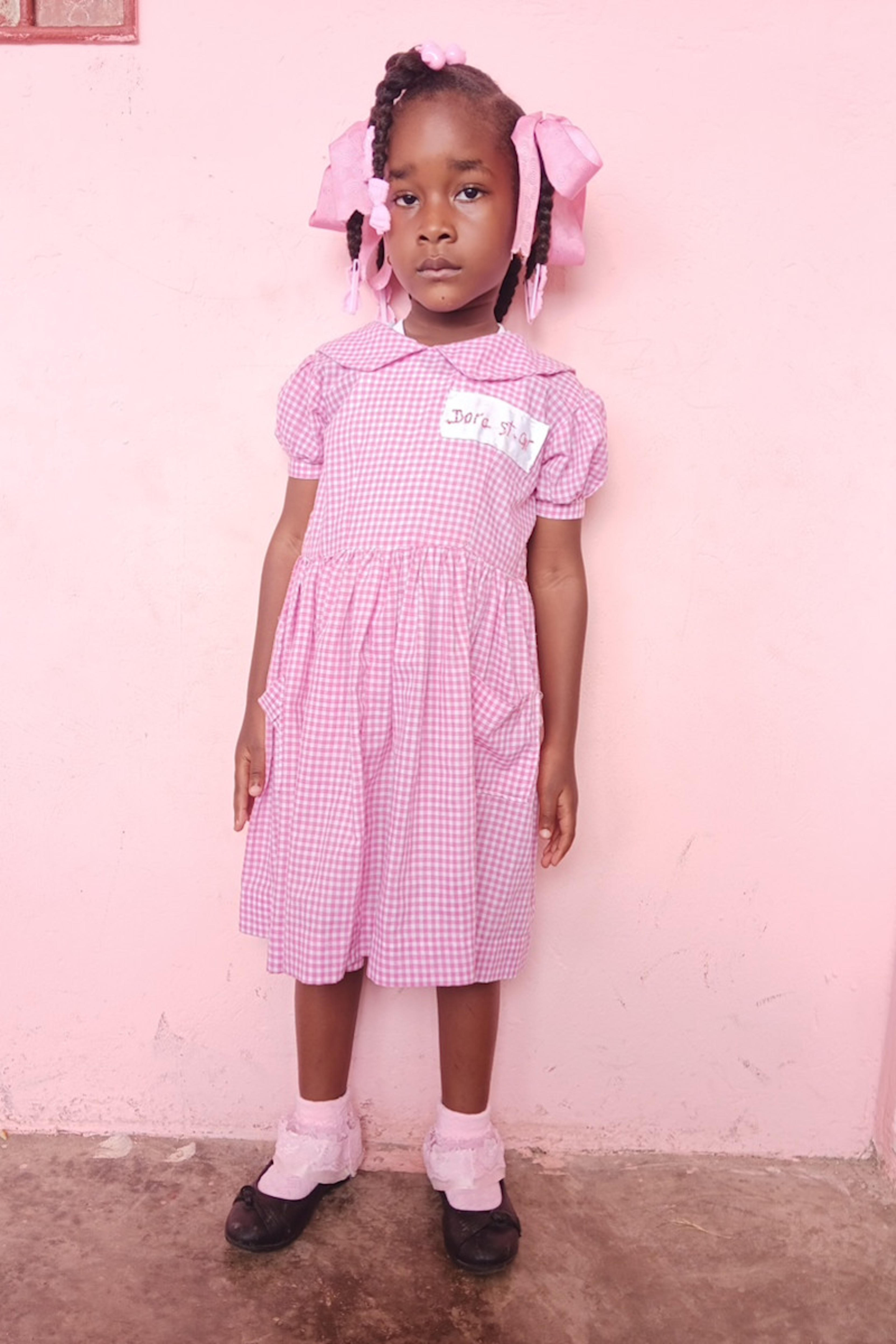 An unsponsored girl named Dora from Haiti who is vulnerable to exploitation and has waited 232 days for a sponsor.