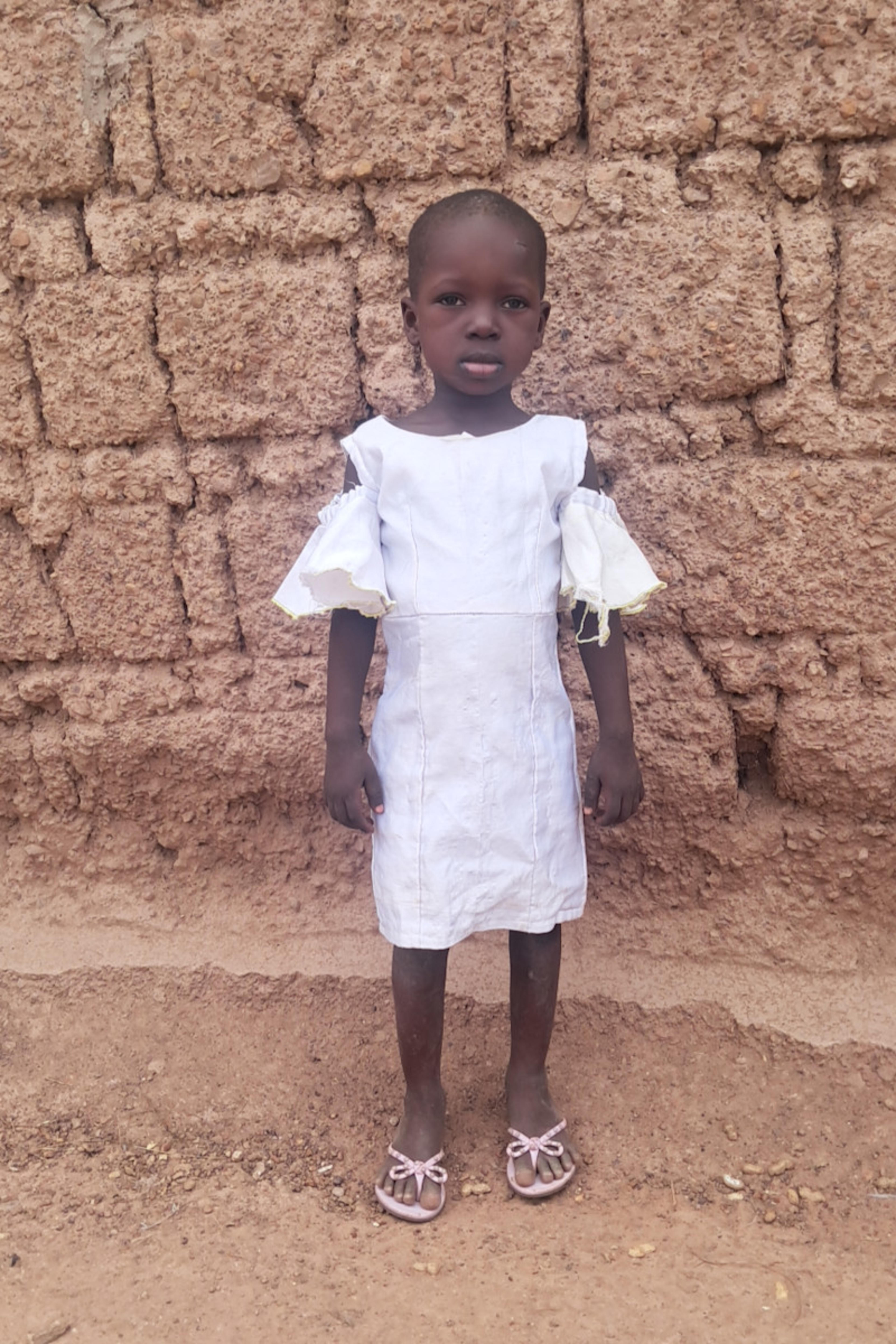 An unsponsored girl named Natasha from Ghana who lives in an AIDS-affected area and has waited 175 days for a sponsor.