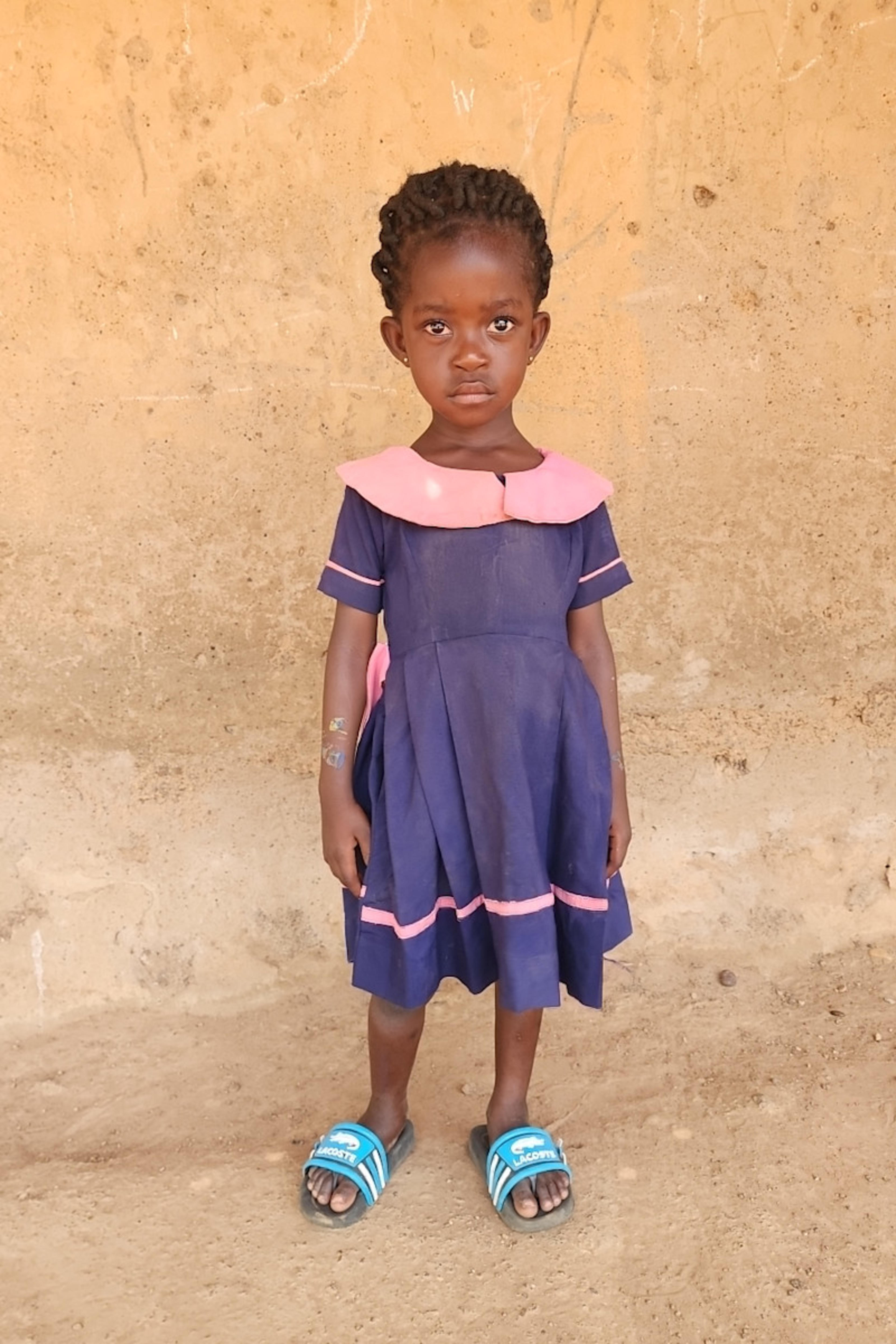 An unsponsored girl named Priscilla from Ghana who lives in an AIDS-affected area and has waited 174 days for a sponsor.