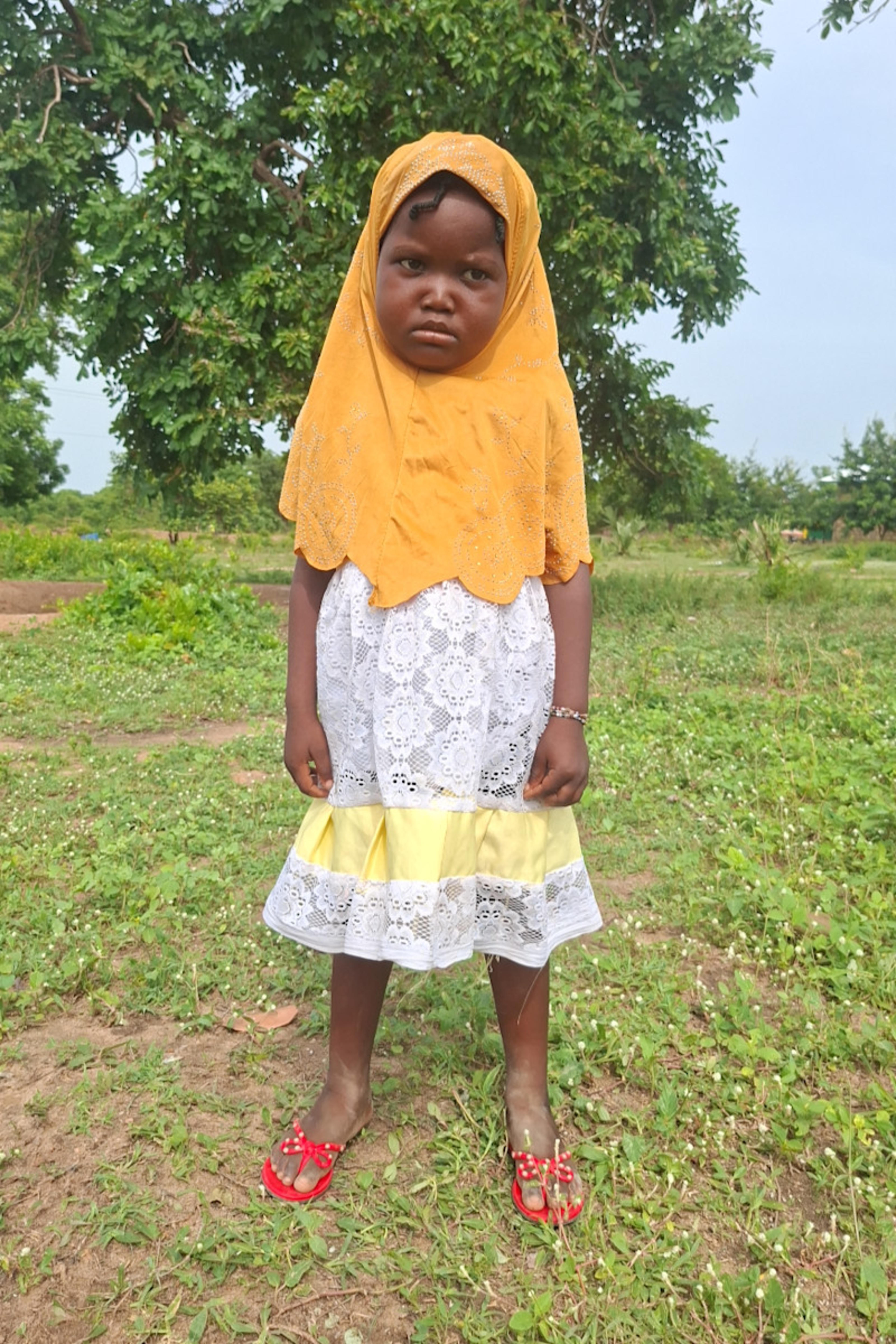 An unsponsored girl named Elham from Ghana who lives in an AIDS-affected area and has waited 141 days for a sponsor.