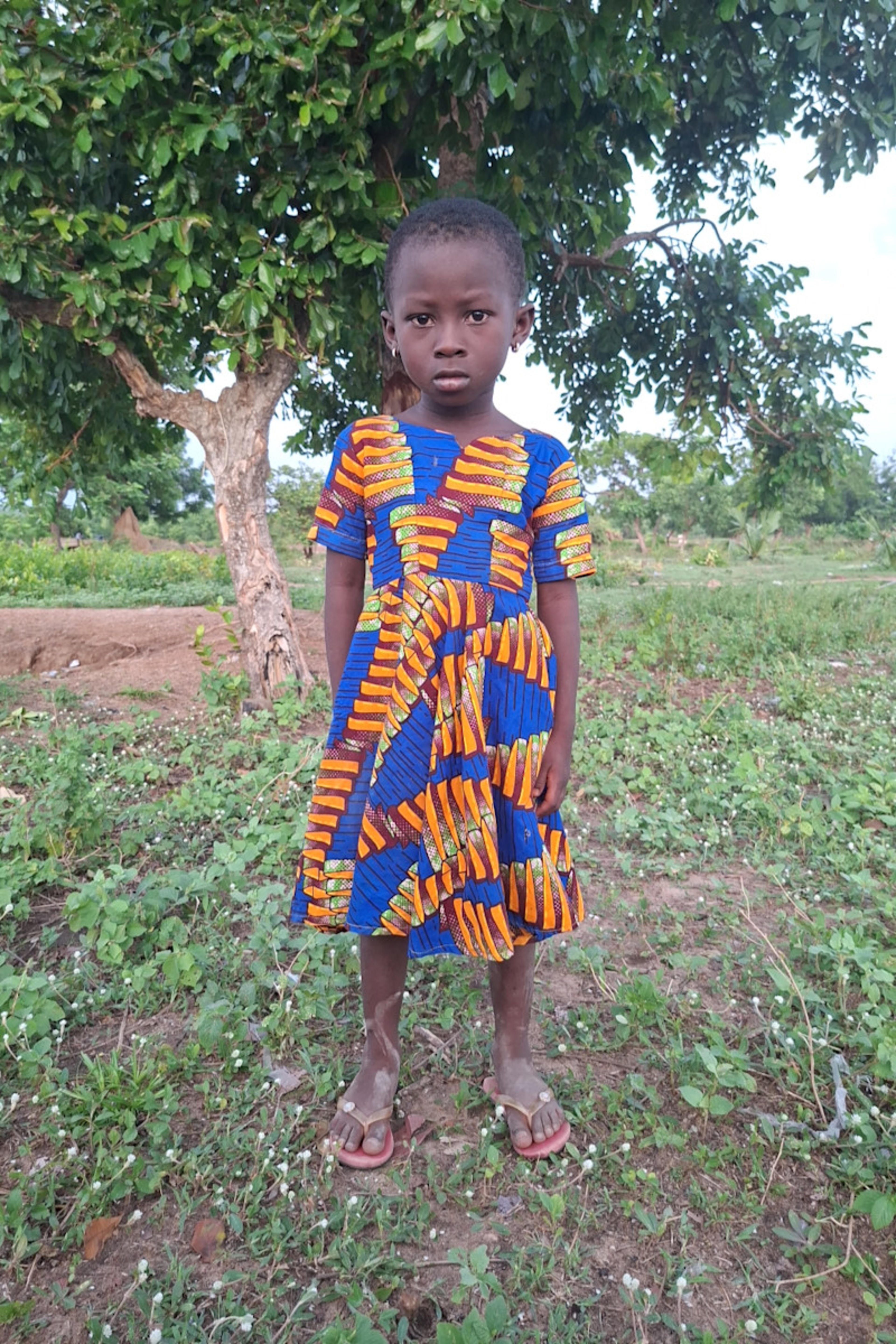 An unsponsored girl named Millicent from Ghana who lives in an AIDS-affected area and has waited 143 days for a sponsor.