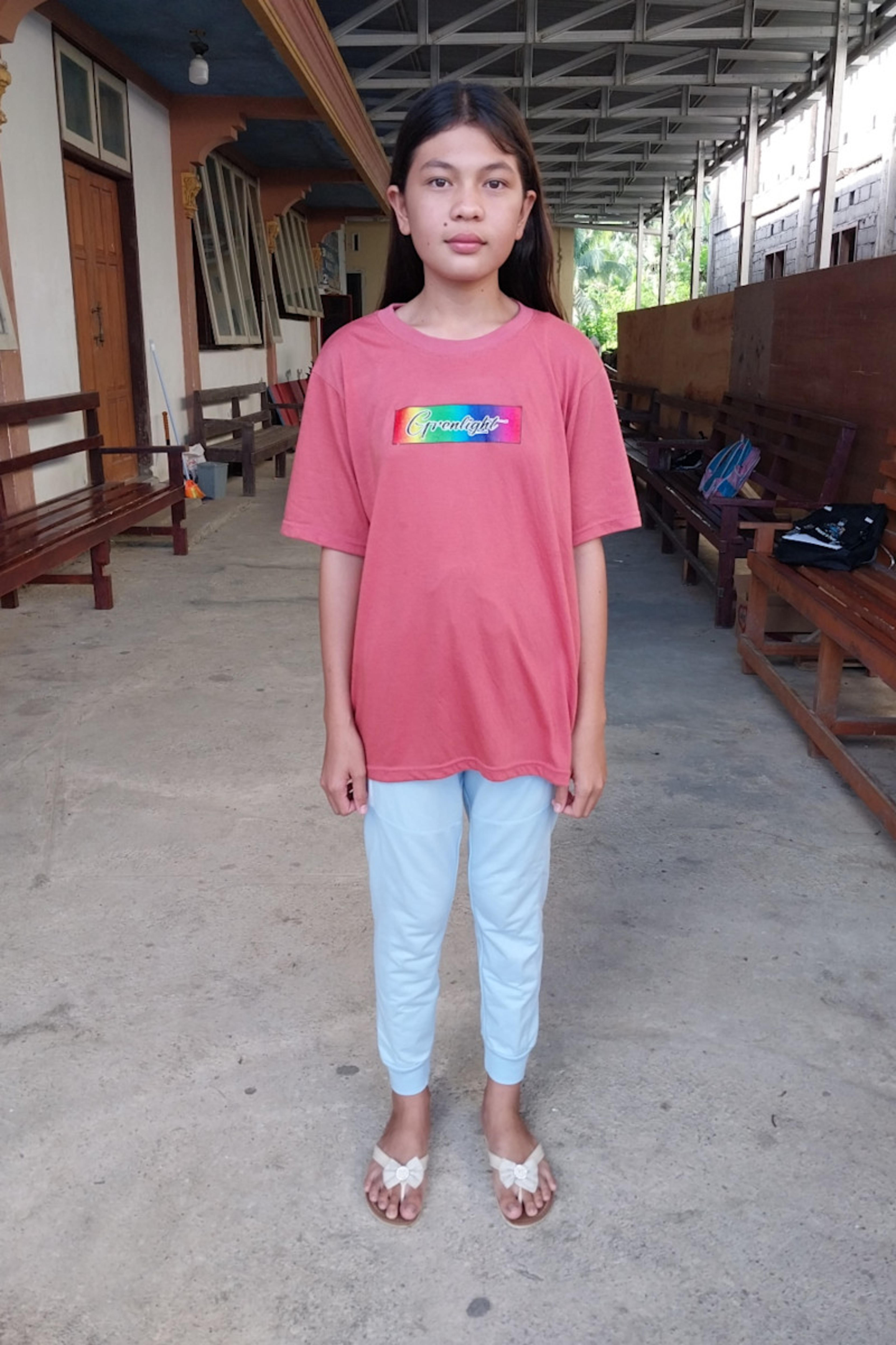 An unsponsored girl named Trifosa from Indonesia who has waited 211 days for a sponsor.