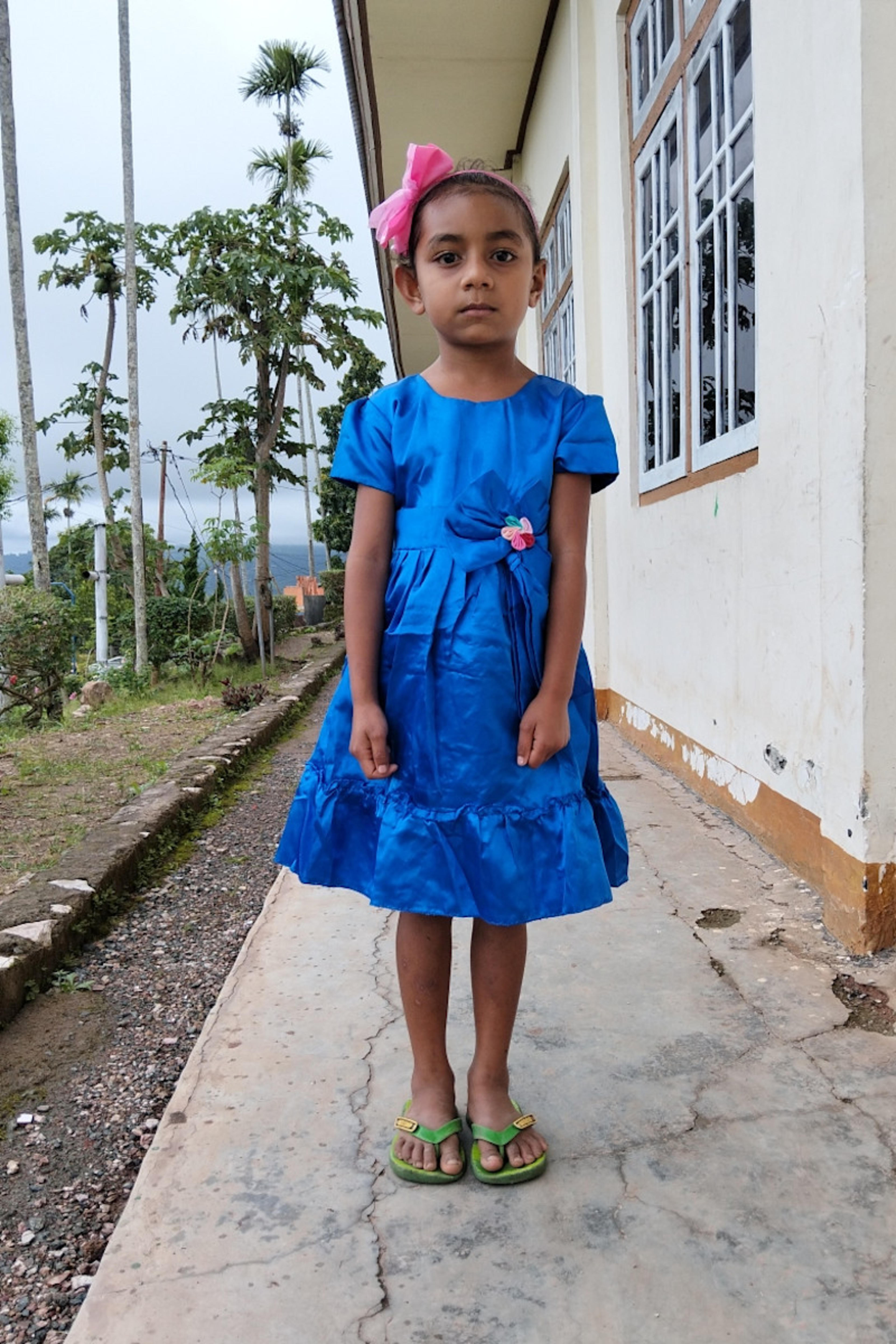 An unsponsored girl named Winda from Indonesia who has waited 559 days for a sponsor.