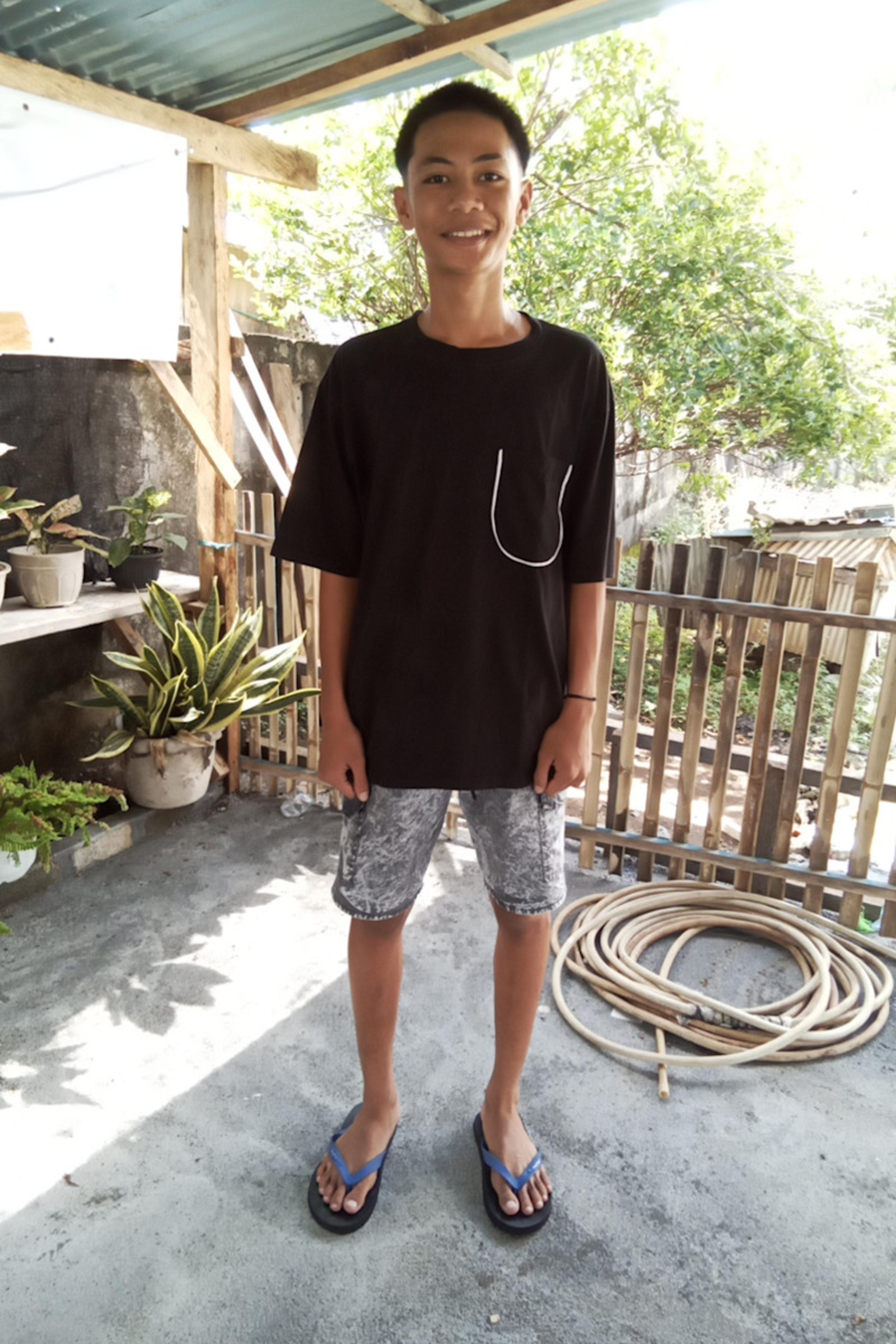 An unsponsored boy named Putra from Indonesia who has waited 674 days for a sponsor.