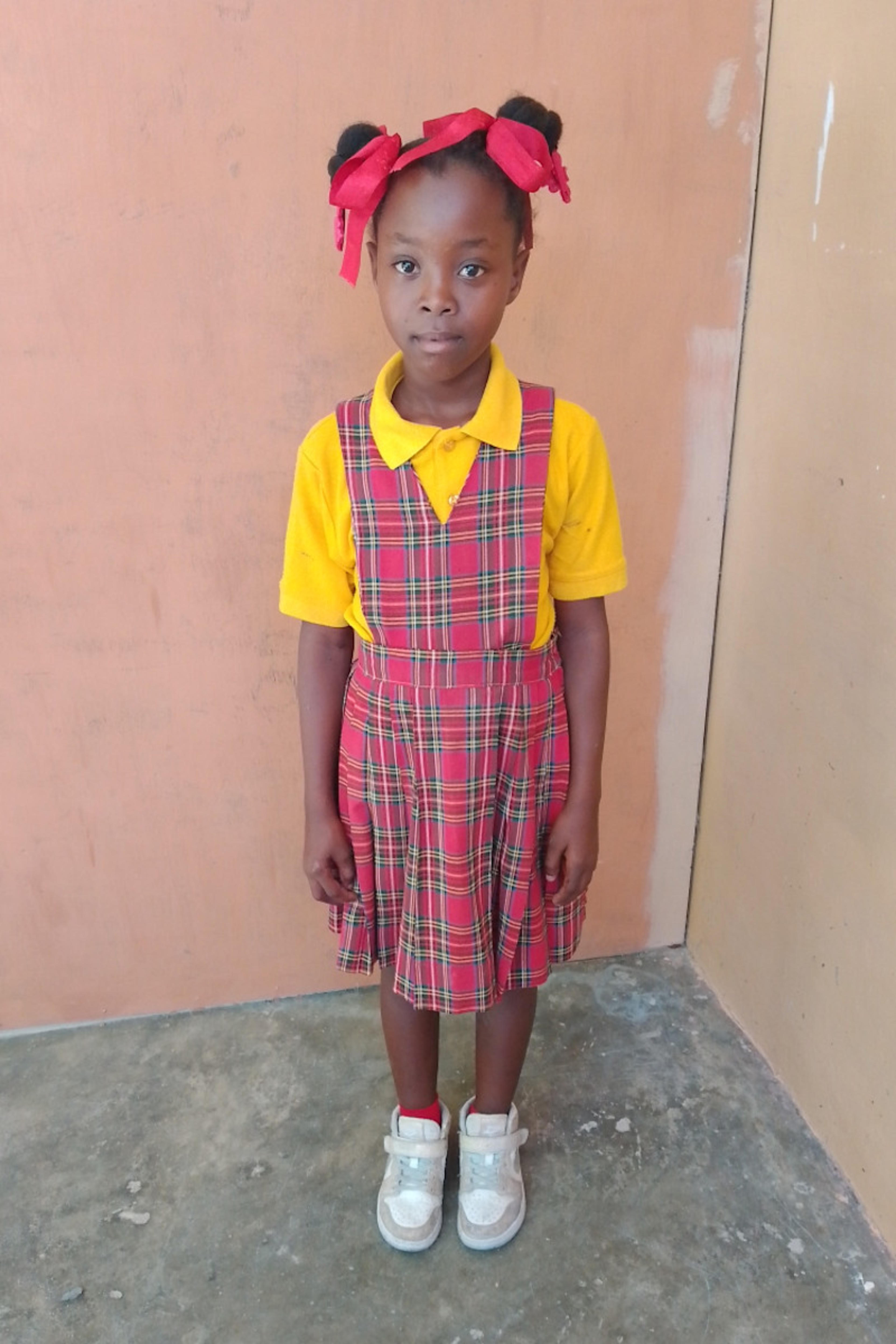 An unsponsored girl named Mama from Haiti who is vulnerable to exploitation and has waited 296 days for a sponsor.