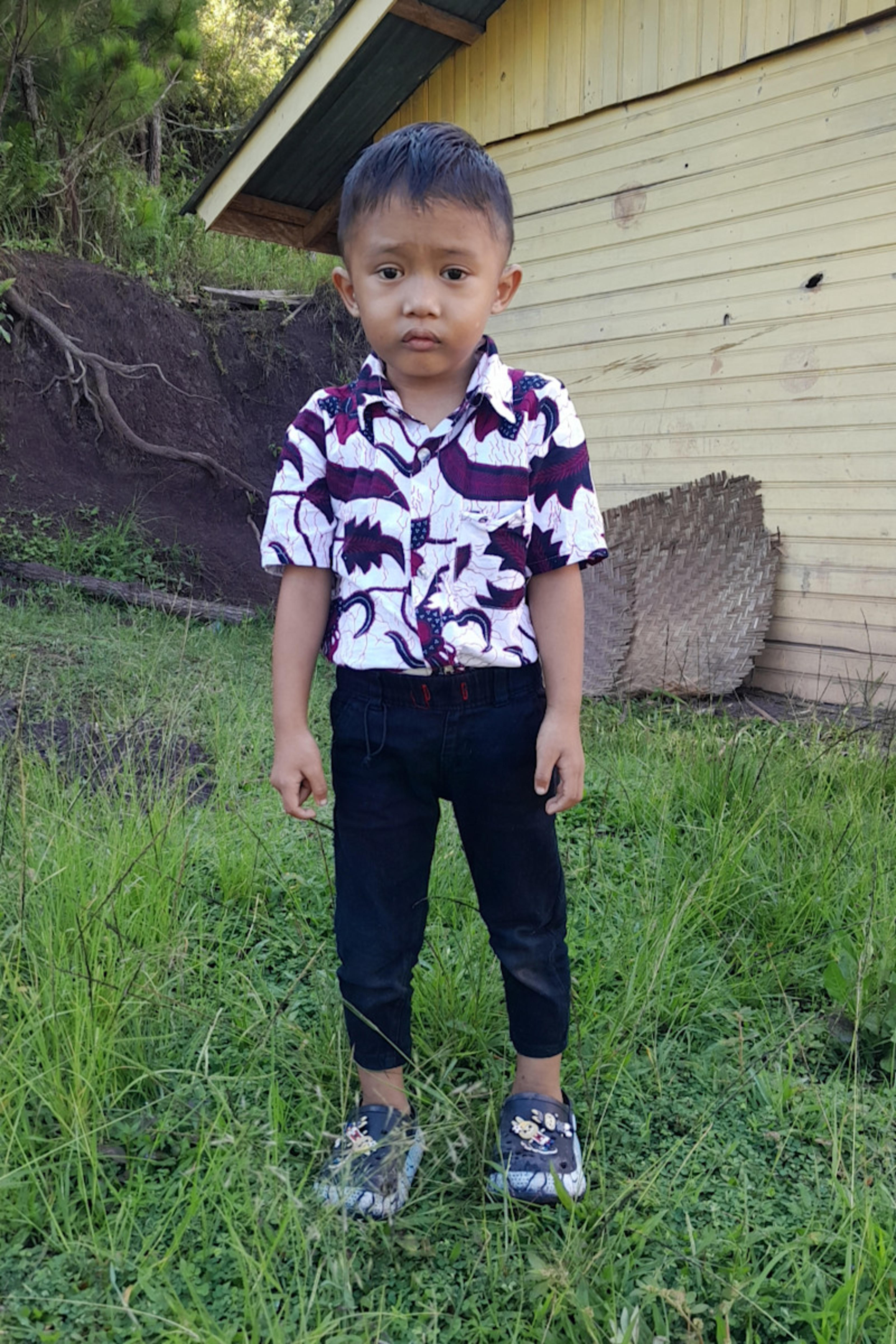 An unsponsored boy named Levin from Indonesia who has waited 585 days for a sponsor.