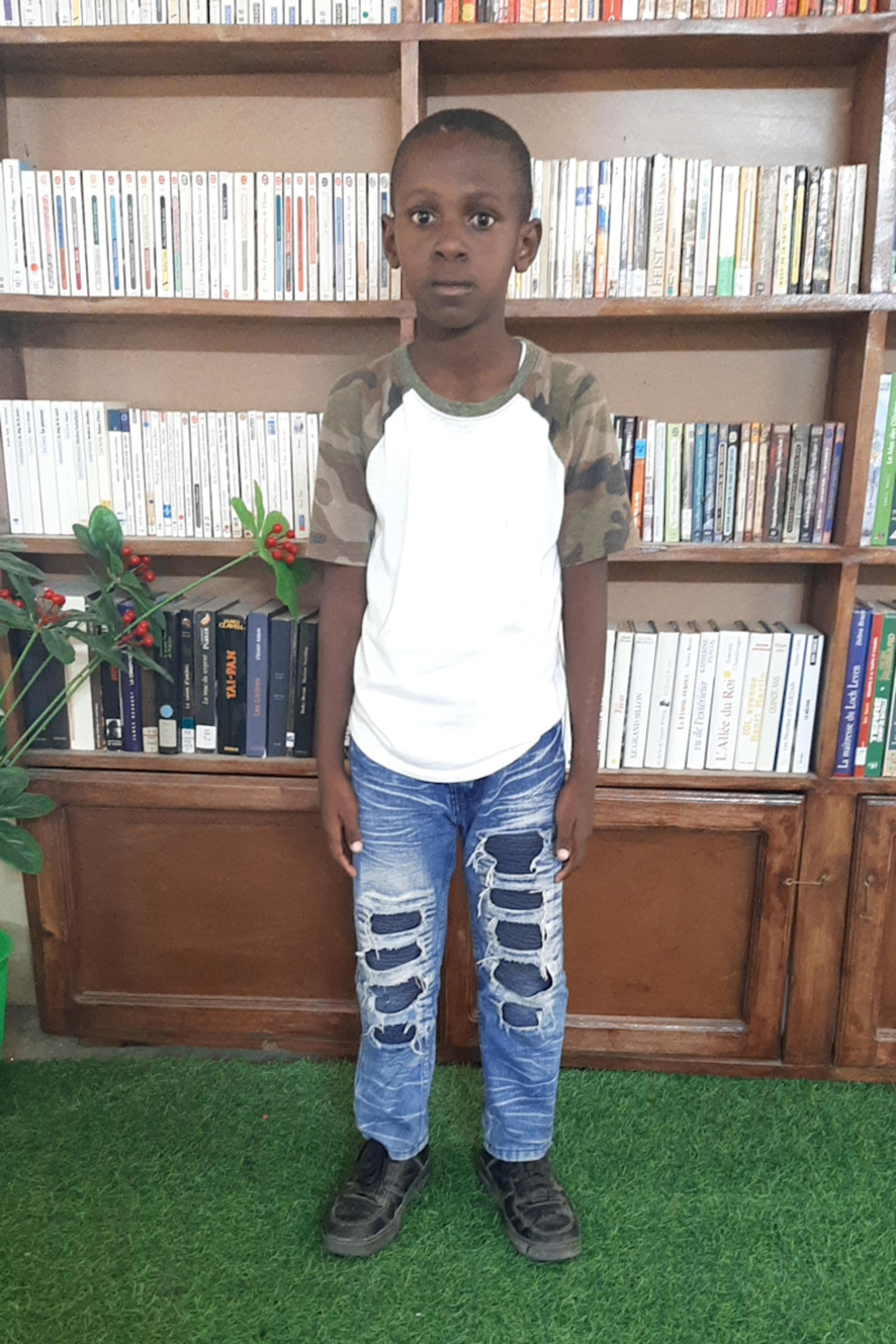 An unsponsored boy named Wood from Haiti who is vulnerable to exploitation and has waited 388 days for a sponsor.