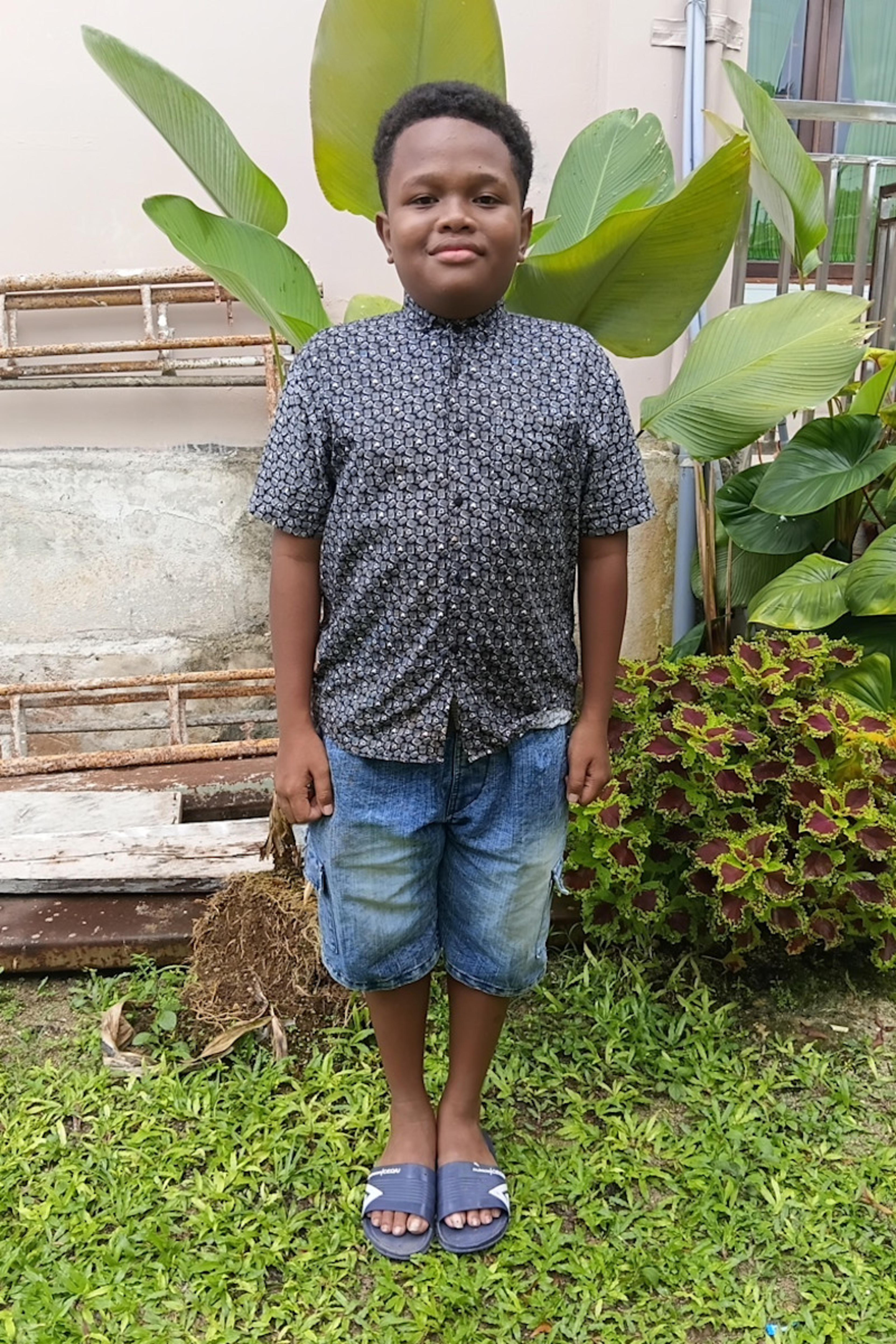 An unsponsored boy named Mambe from Indonesia who has waited 665 days for a sponsor.