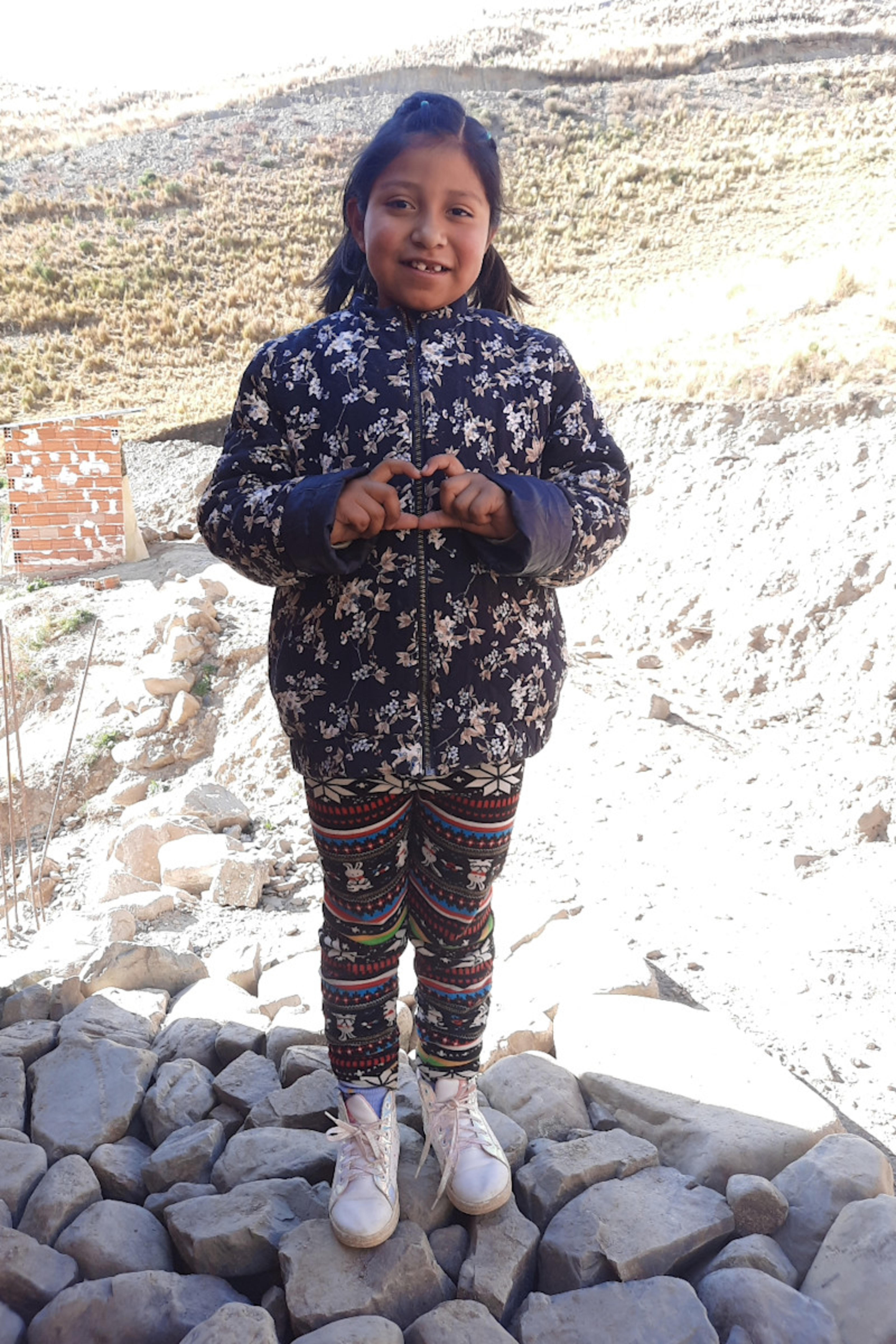 An unsponsored girl named Nicol Diana from Bolivia who has waited 559 days for a sponsor.