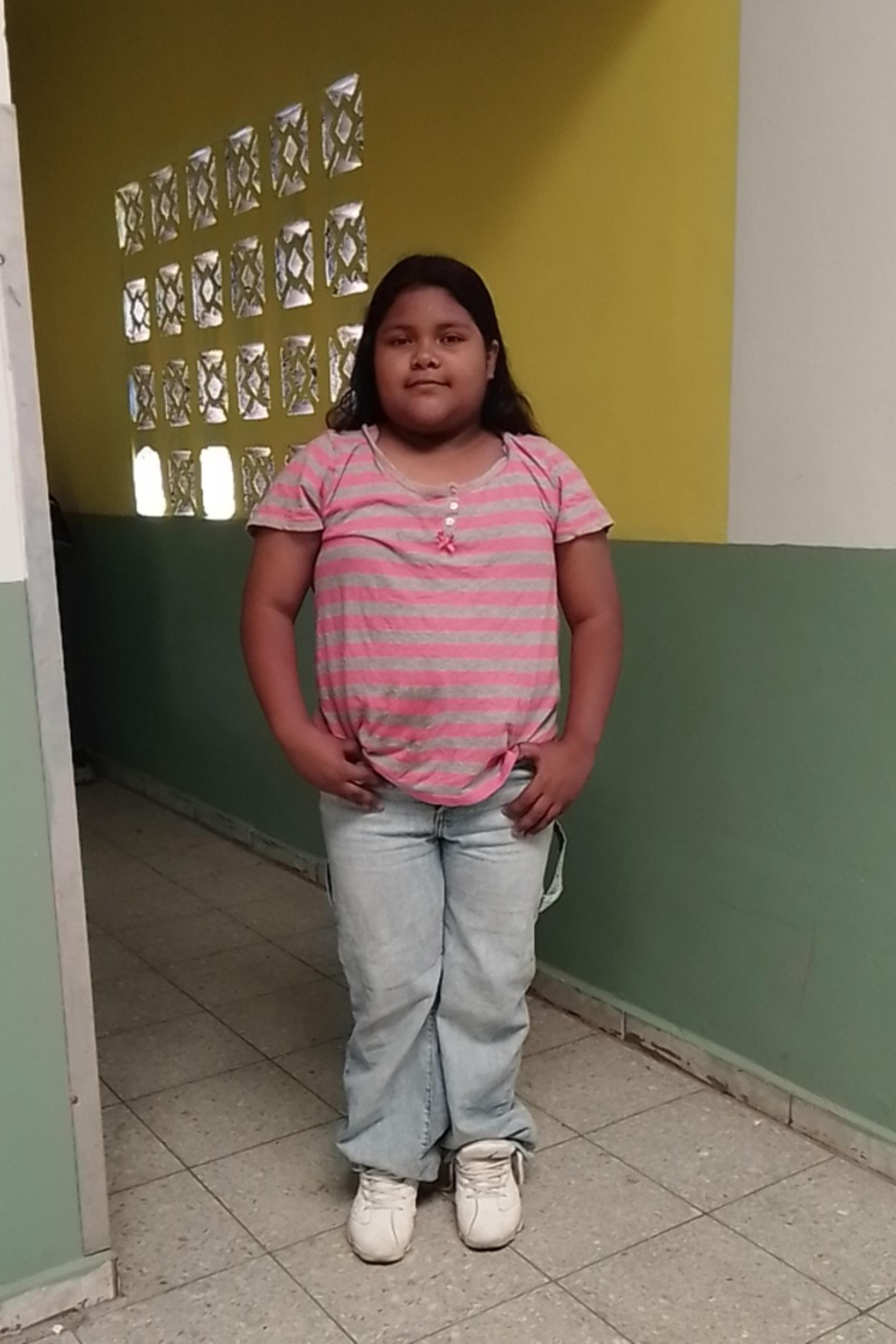 An unsponsored girl named Genesis from Honduras who has waited 574 days for a sponsor.