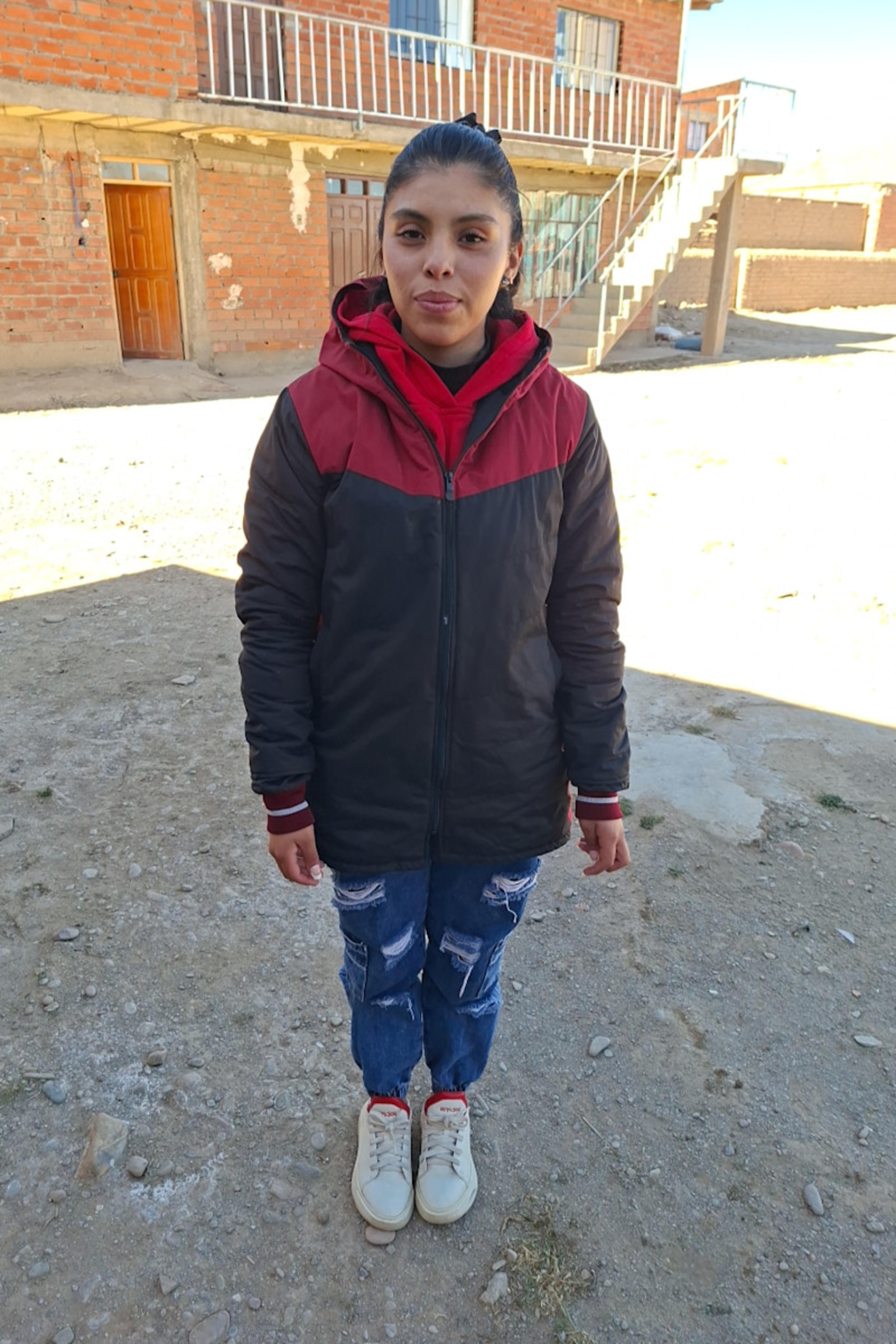 An unsponsored girl named Yhoselin from Bolivia who has waited 199 days for a sponsor.