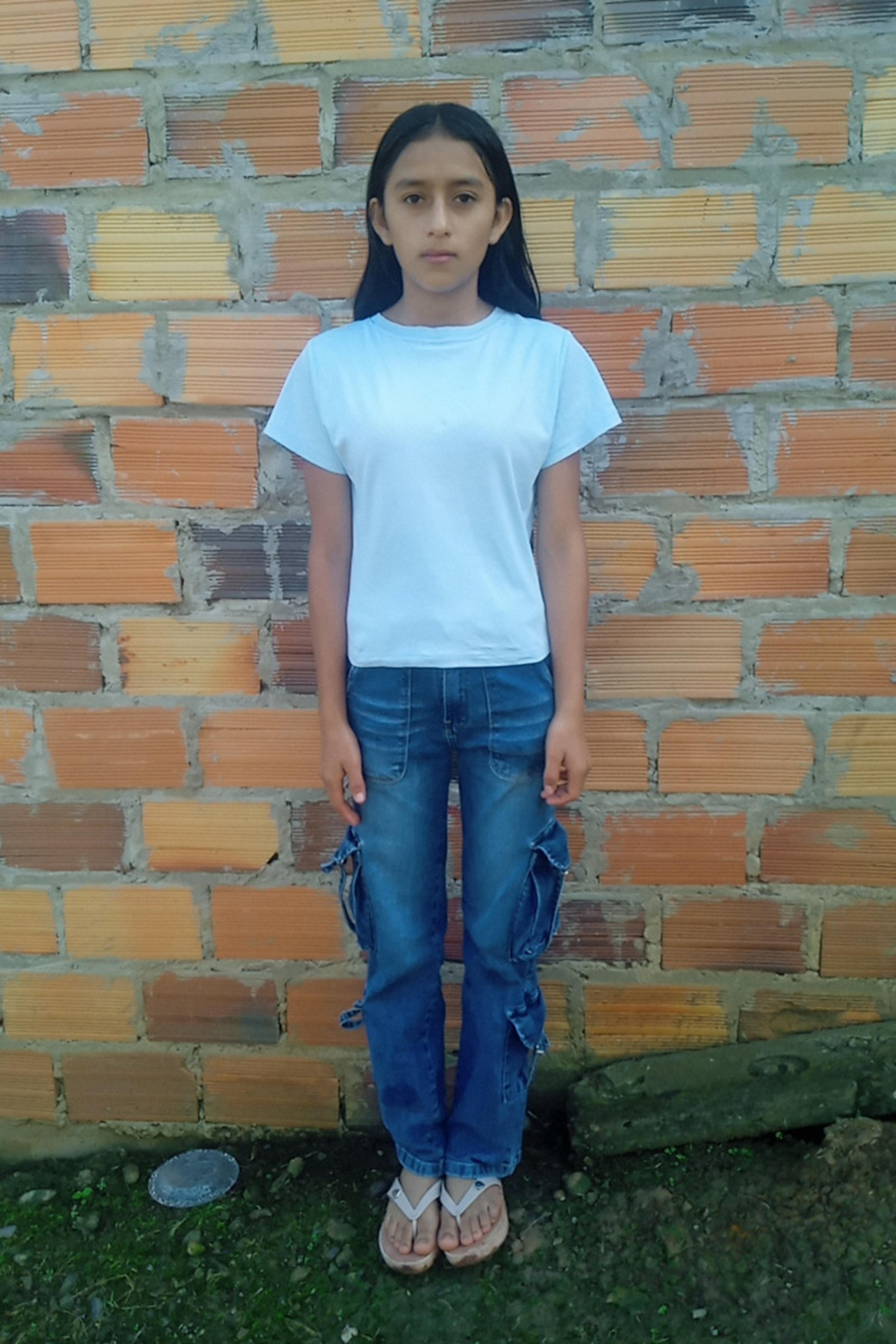 An unsponsored girl named Jhessica from Peru who has waited 512 days for a sponsor.