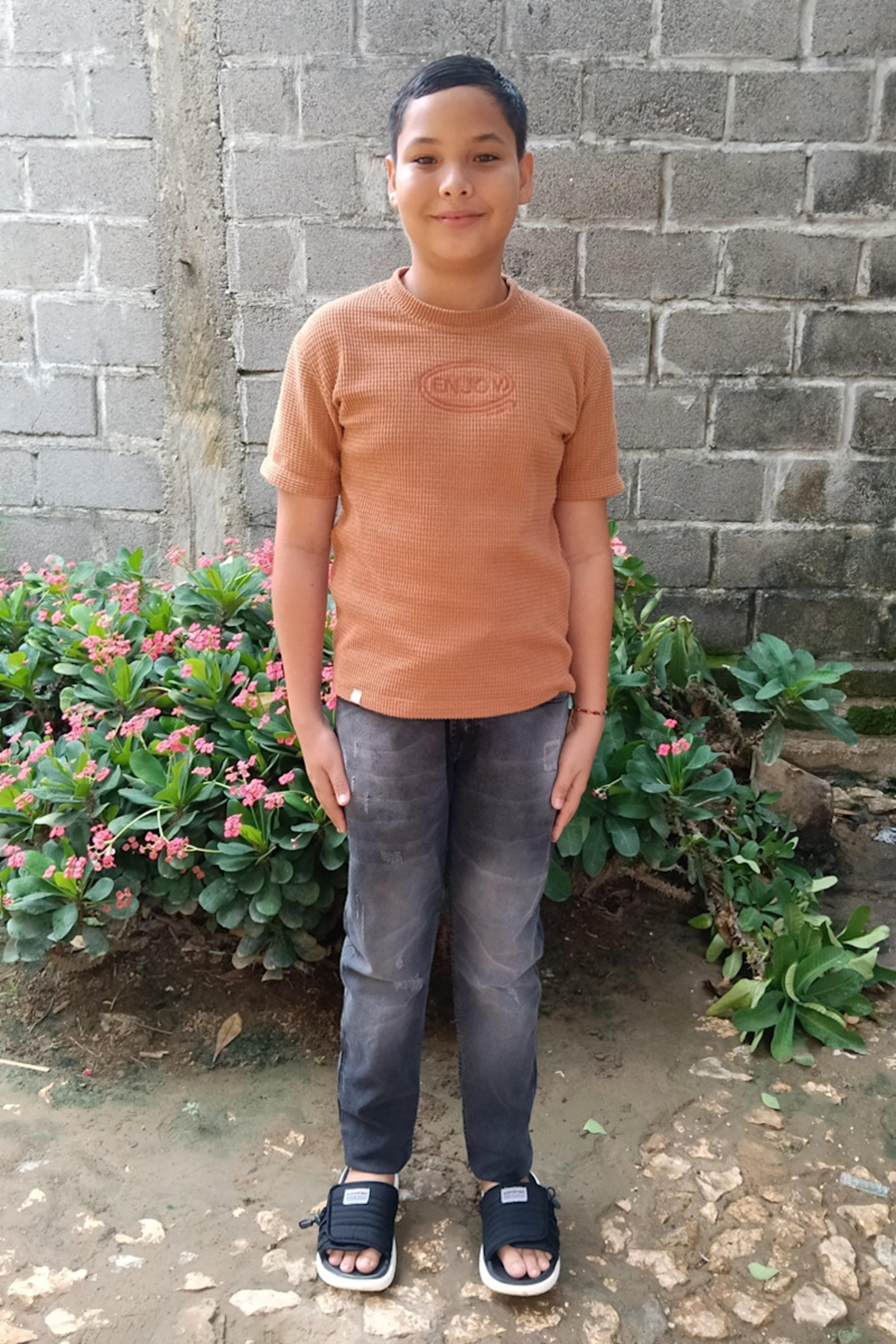 An unsponsored boy named Martin from Colombia who has waited 699 days for a sponsor.