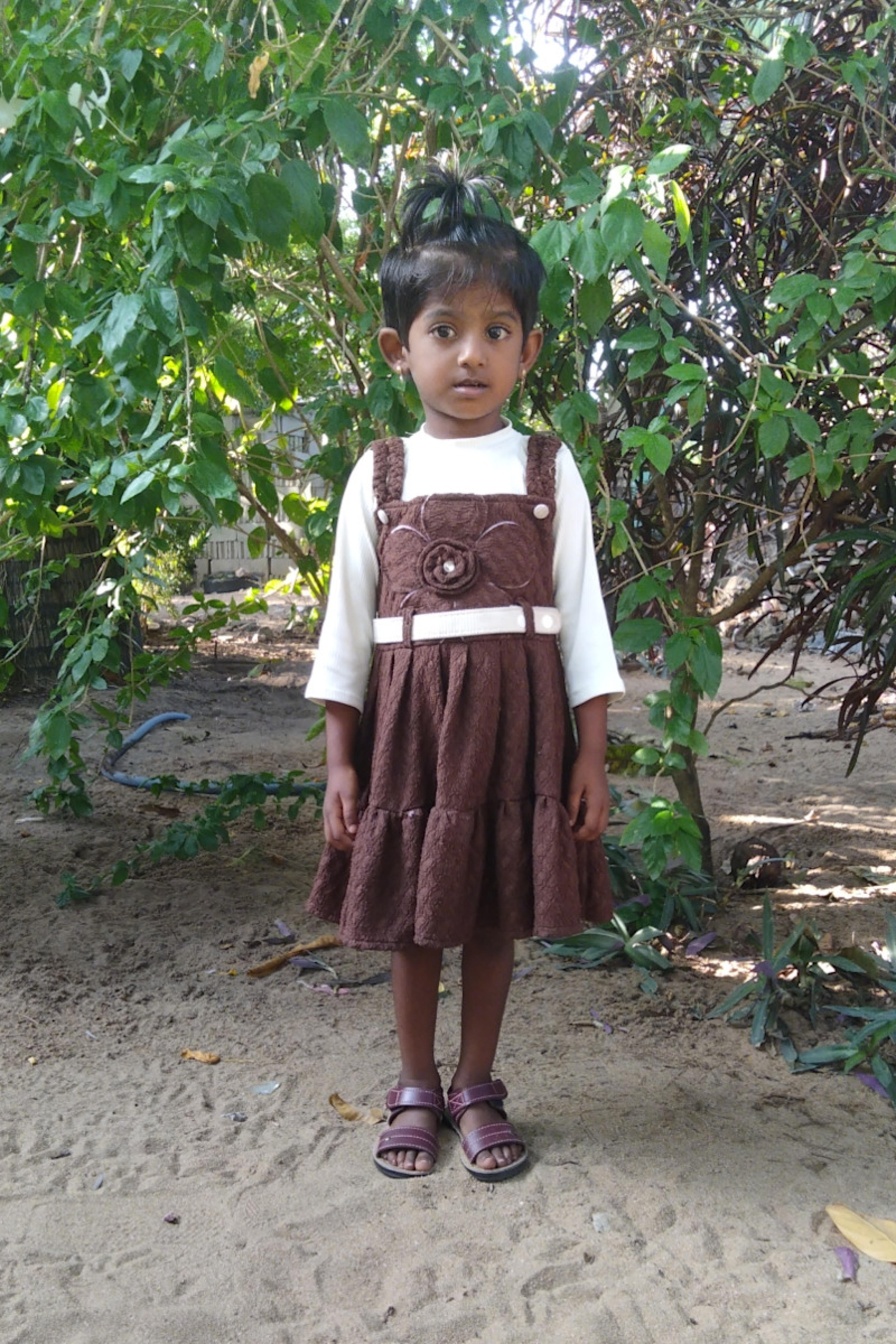 An unsponsored girl named Vigashini from Sri Lanka who has waited 657 days for a sponsor.