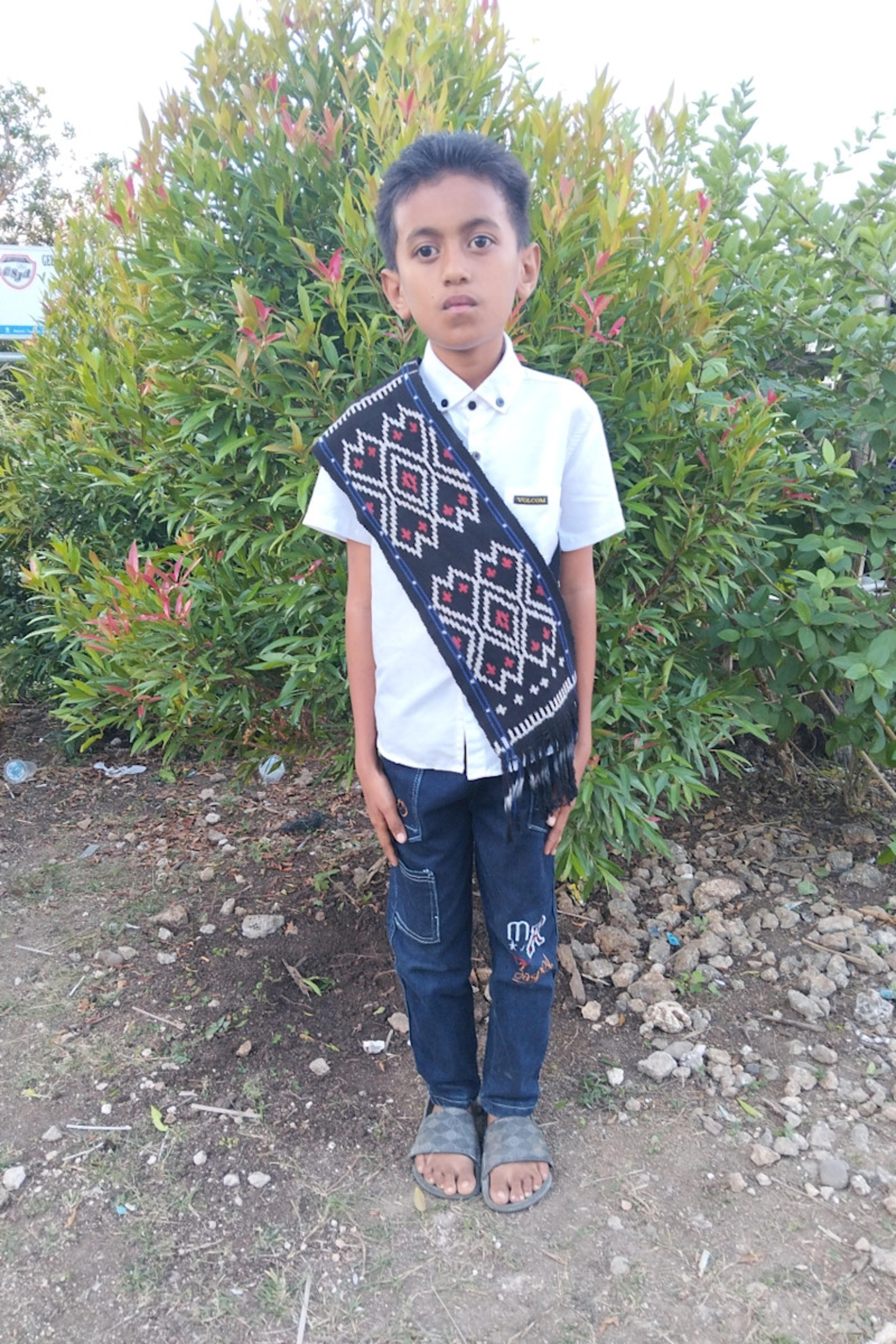 An unsponsored boy named Juan from Indonesia who has waited 599 days for a sponsor.