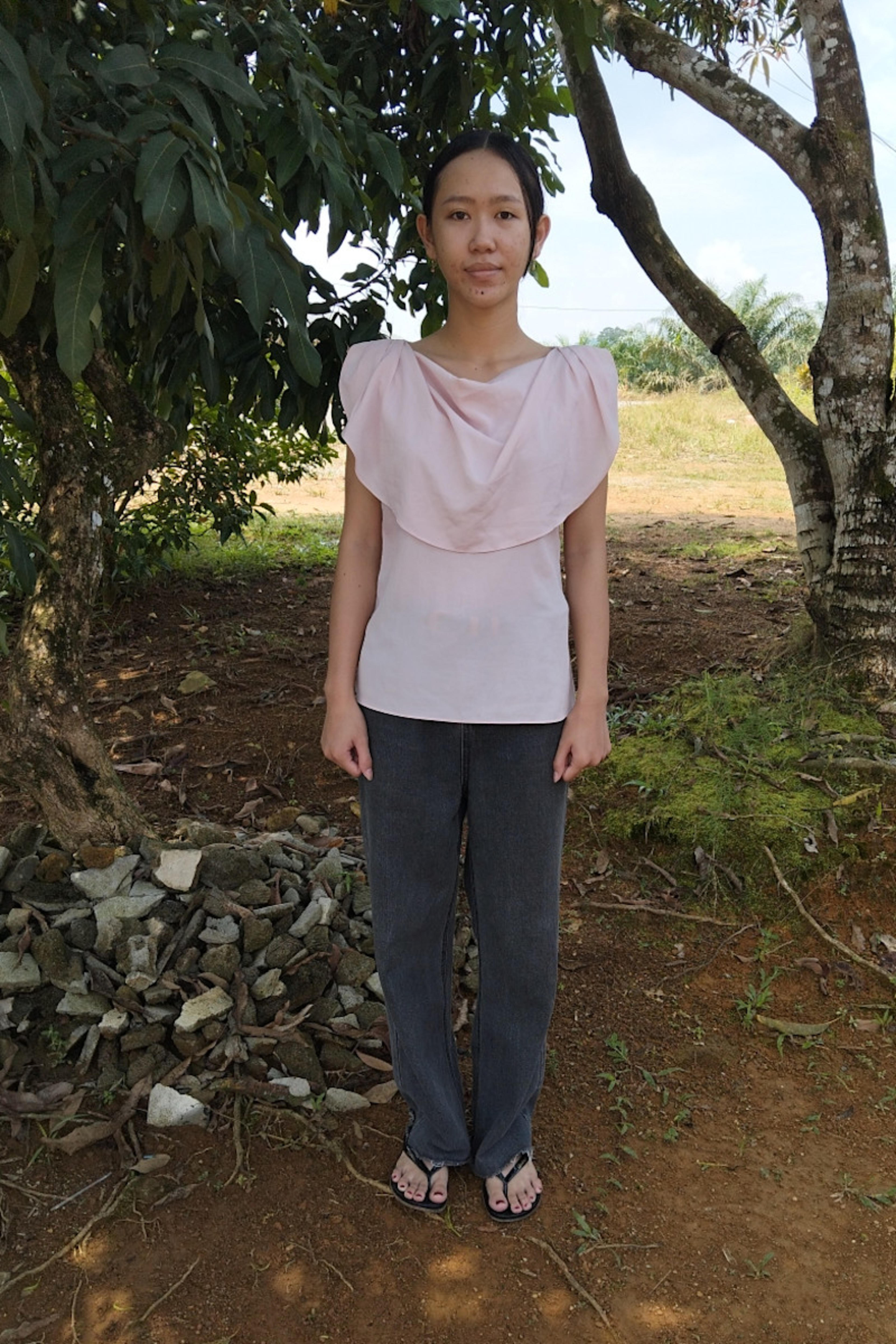 An unsponsored girl named Apri from Indonesia who has waited 7 days for a sponsor.