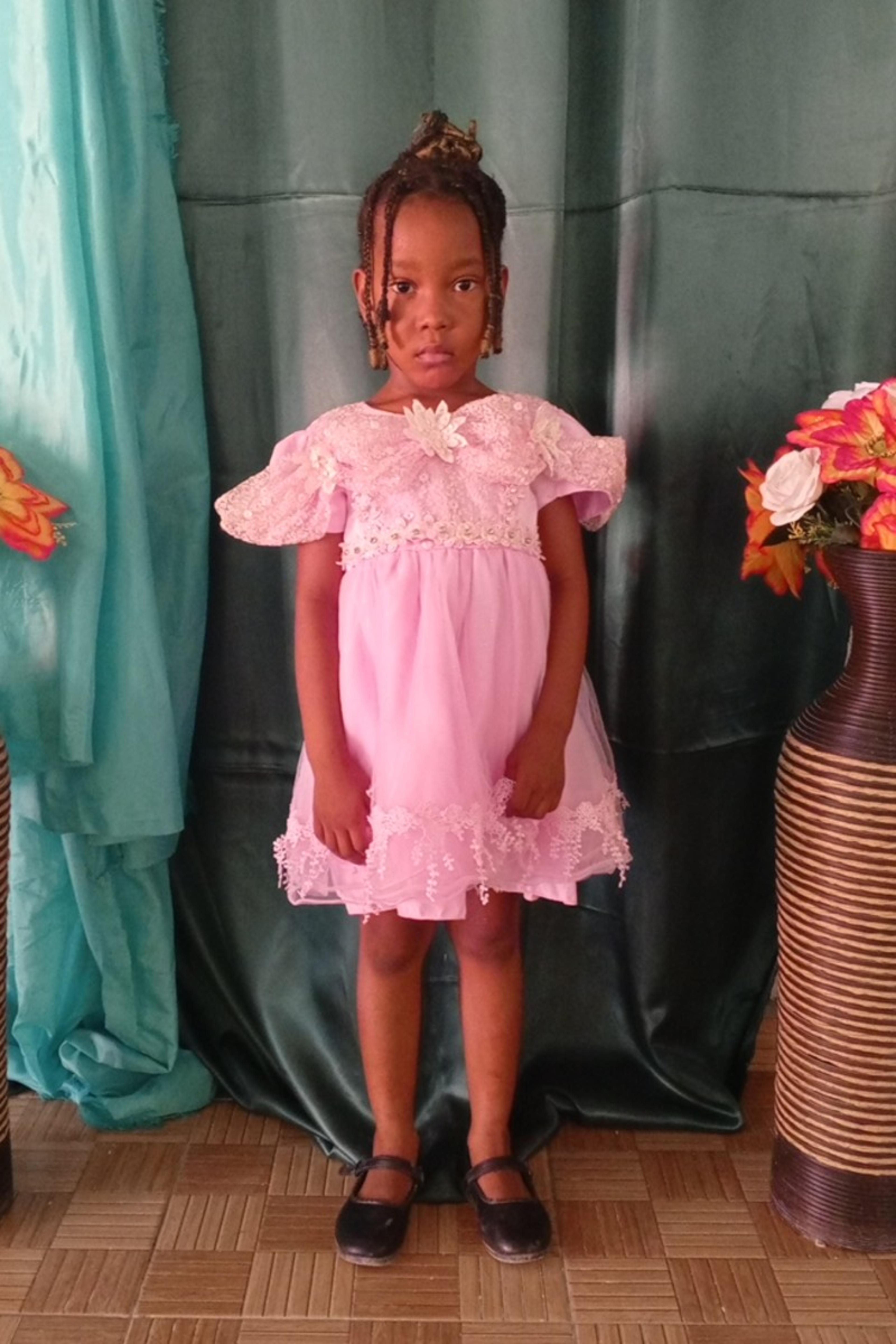 An unsponsored girl named Stermicha from Haiti who is vulnerable to exploitation and has waited 589 days for a sponsor.
