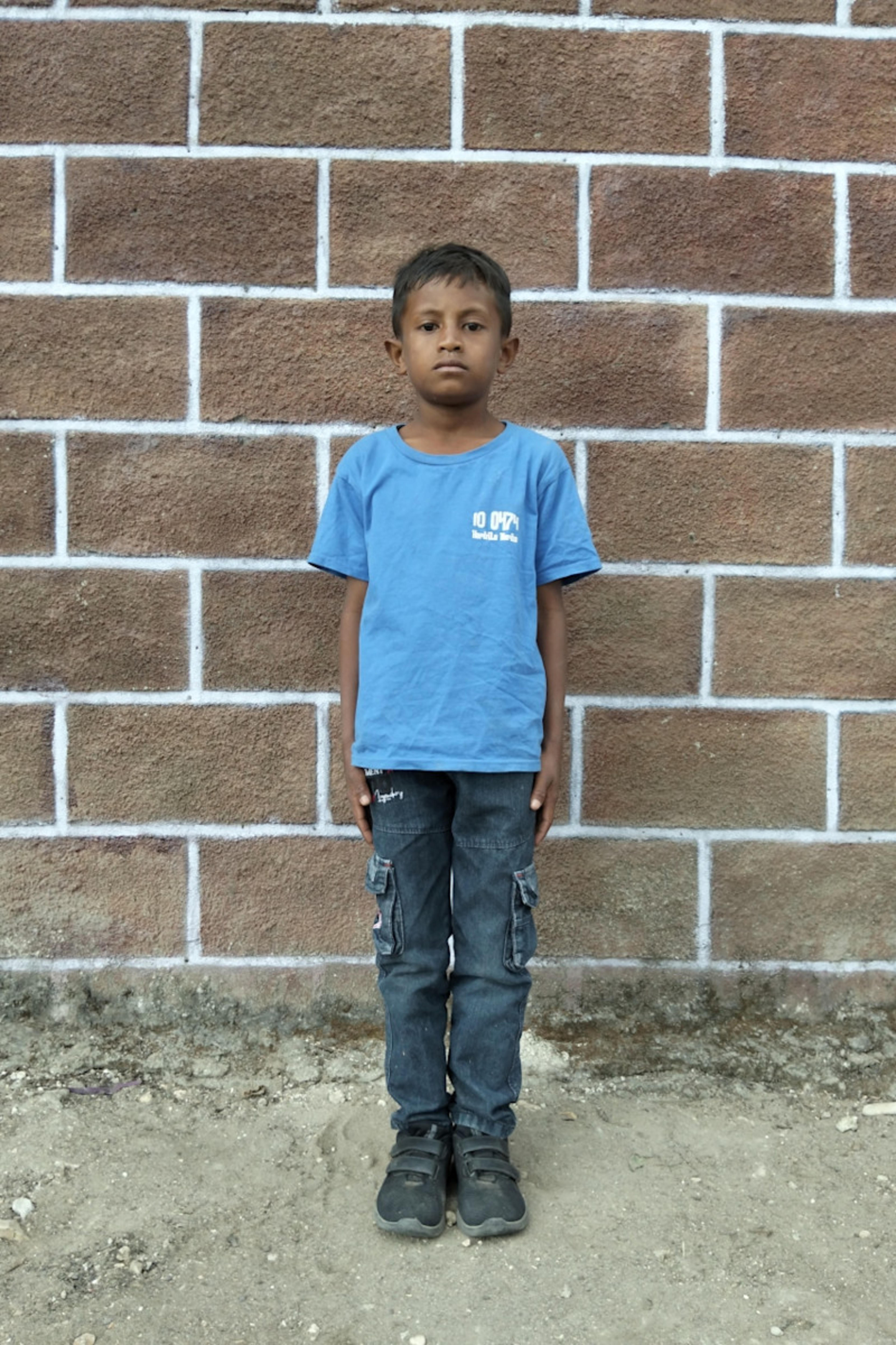 An unsponsored boy named Arka from Indonesia who has waited 524 days for a sponsor.