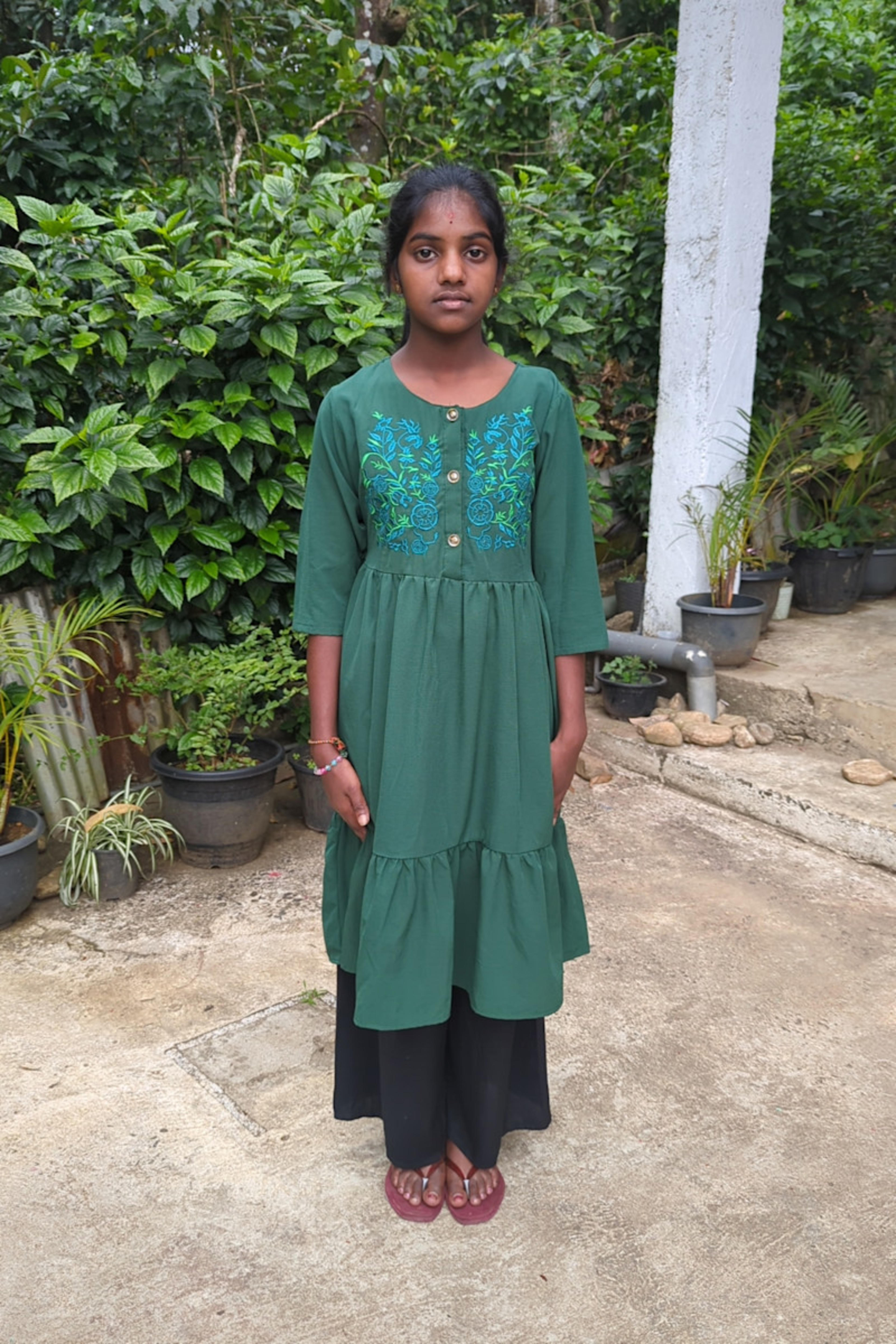 An unsponsored girl named Keshani from Sri Lanka who has waited 423 days for a sponsor.