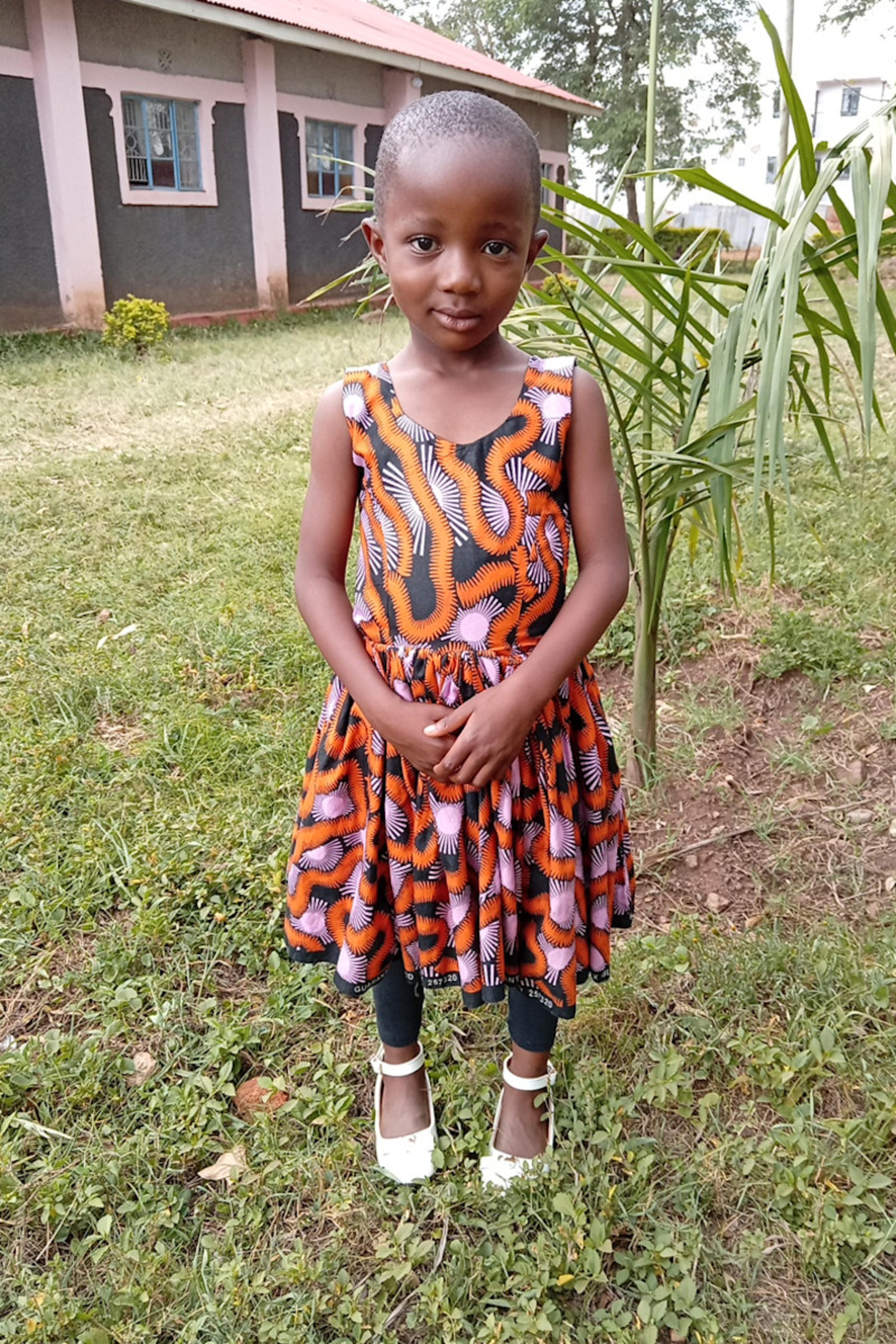 An unsponsored girl named Nchagwa from Kenya who lives in an AIDS-affected area and has waited 599 days for a sponsor.