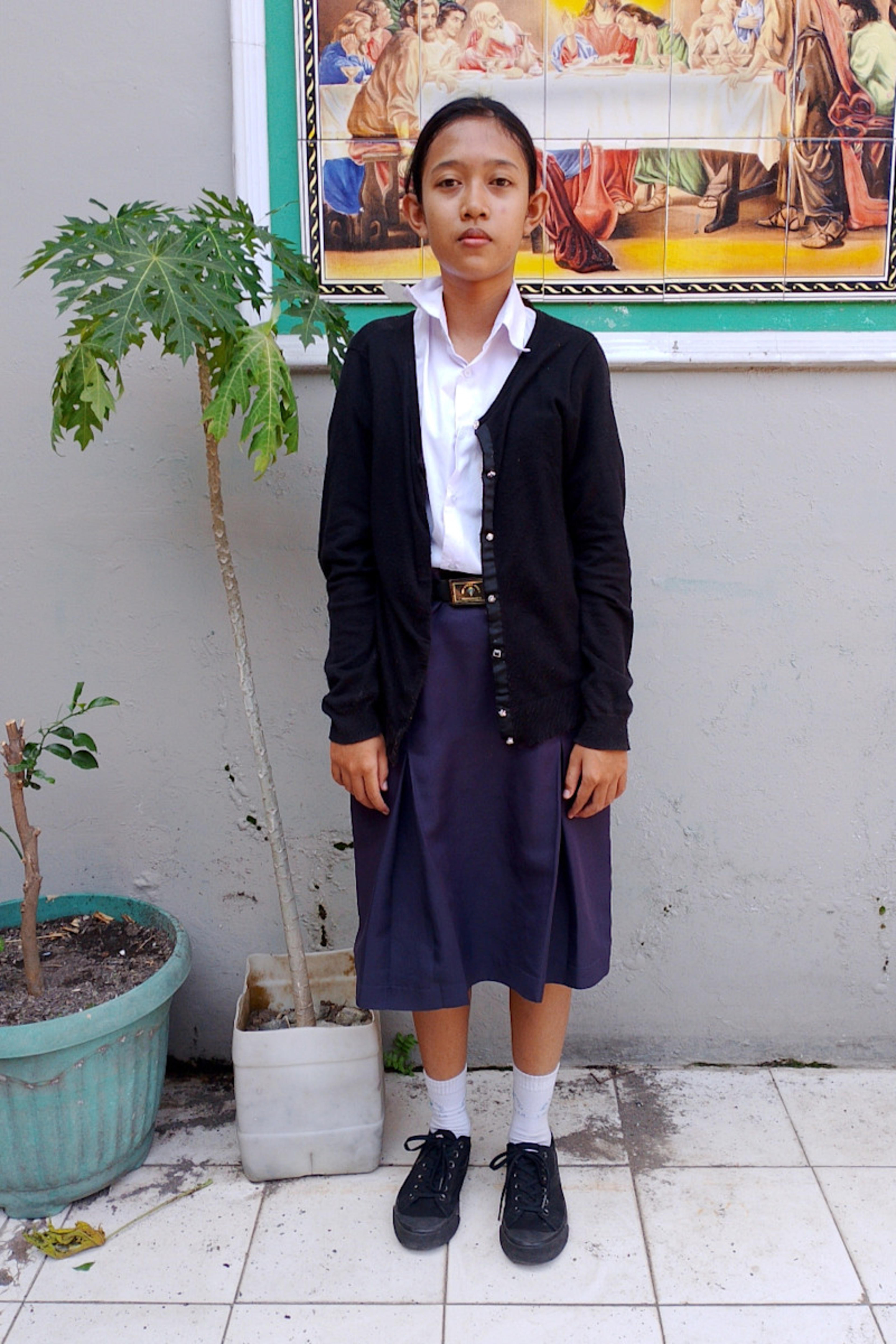 An unsponsored girl named Cynara from Indonesia who has waited 166 days for a sponsor.