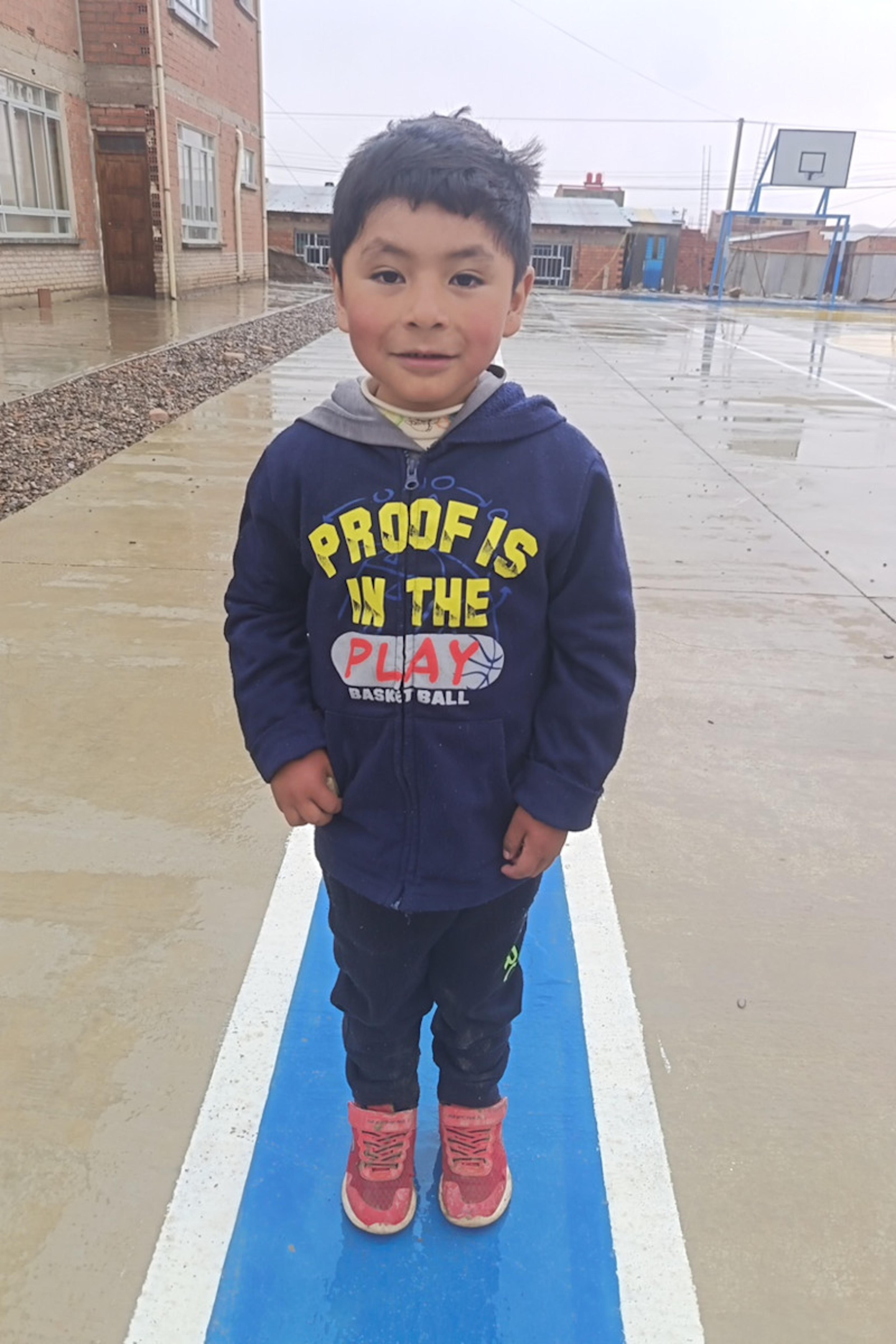 An unsponsored boy named Yair from Bolivia who has waited 672 days for a sponsor.