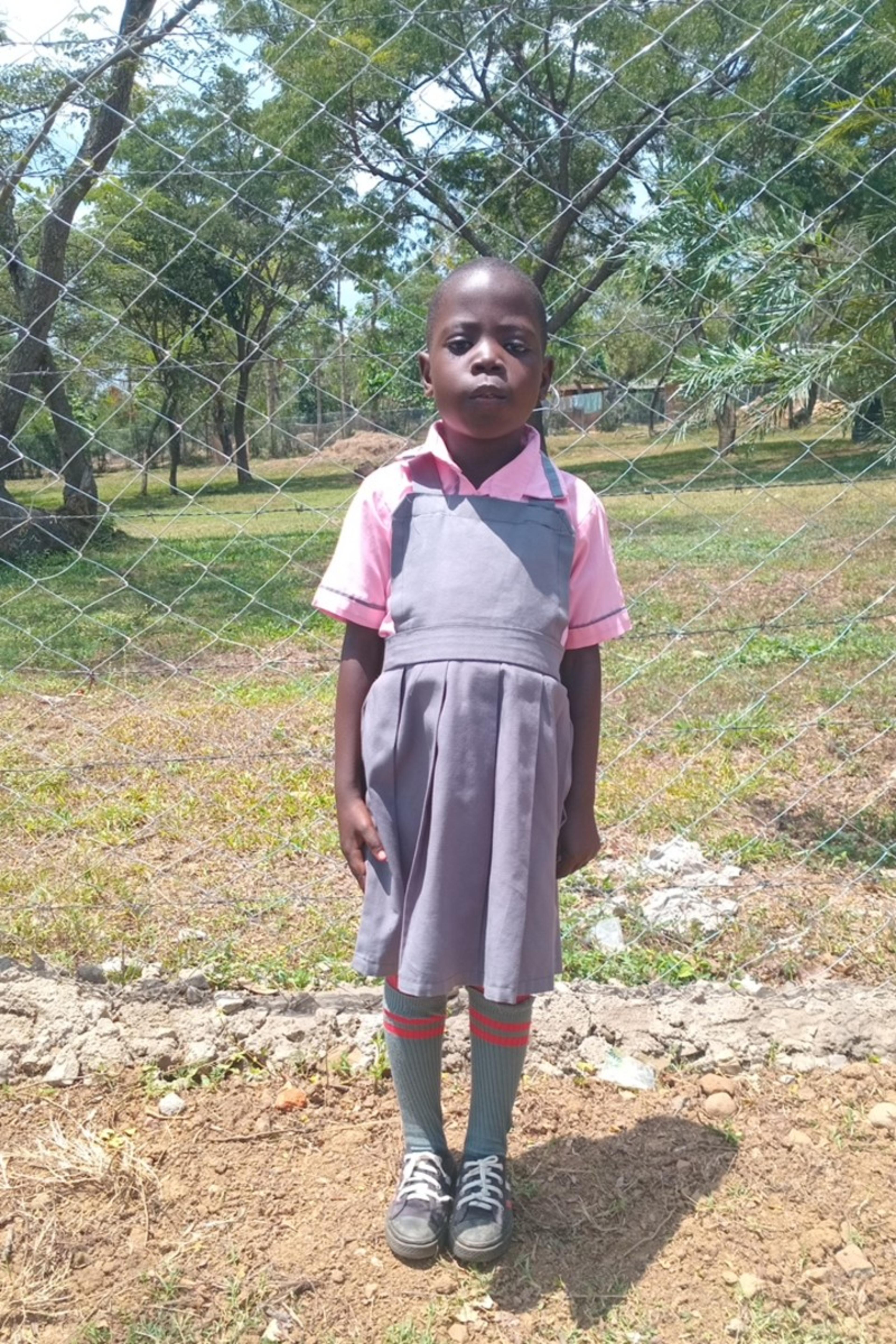 An unsponsored girl named Natalia from Kenya who lives in an AIDS-affected area and has waited 563 days for a sponsor.