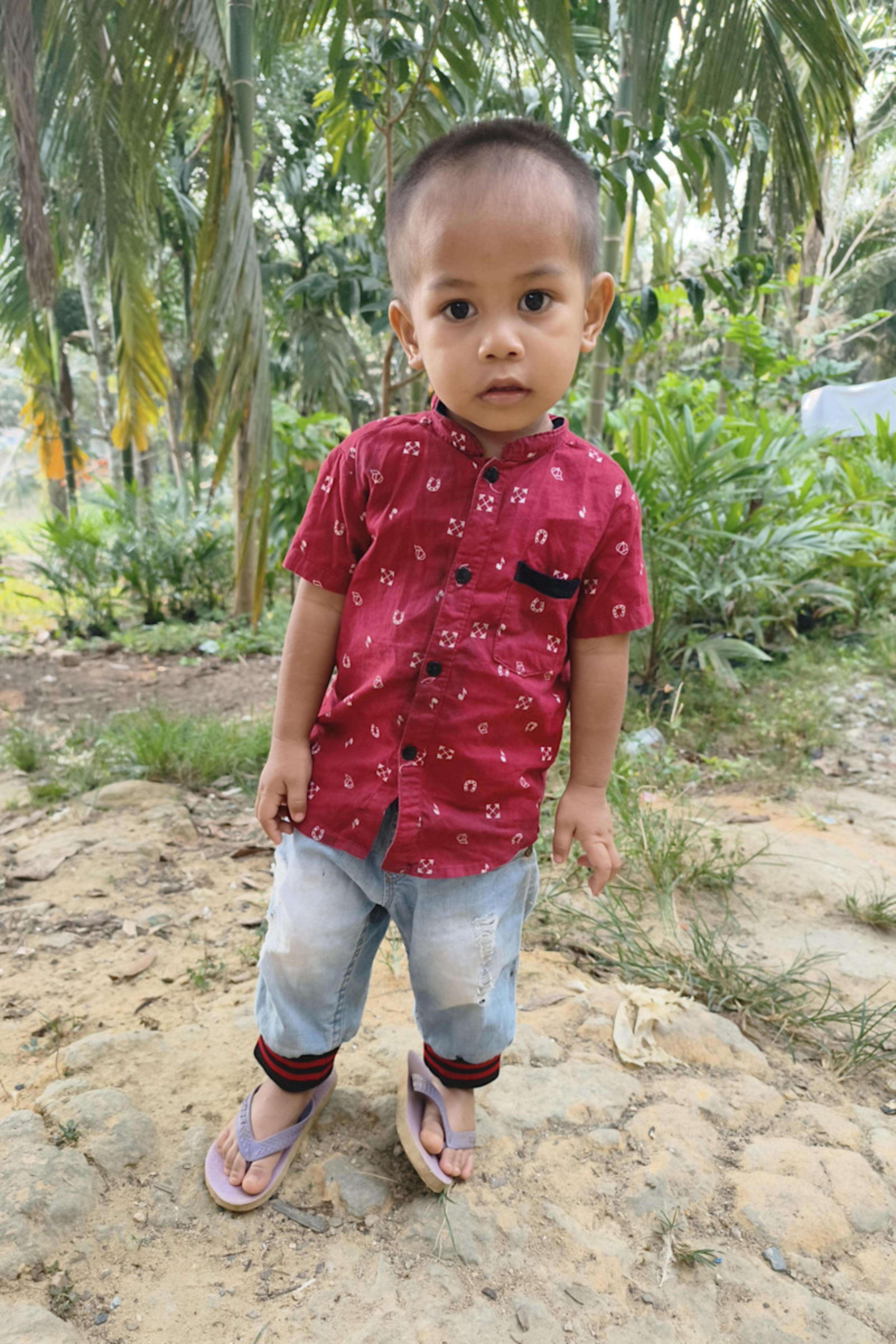 An unsponsored boy named Tan from Indonesia who has waited 538 days for a sponsor.