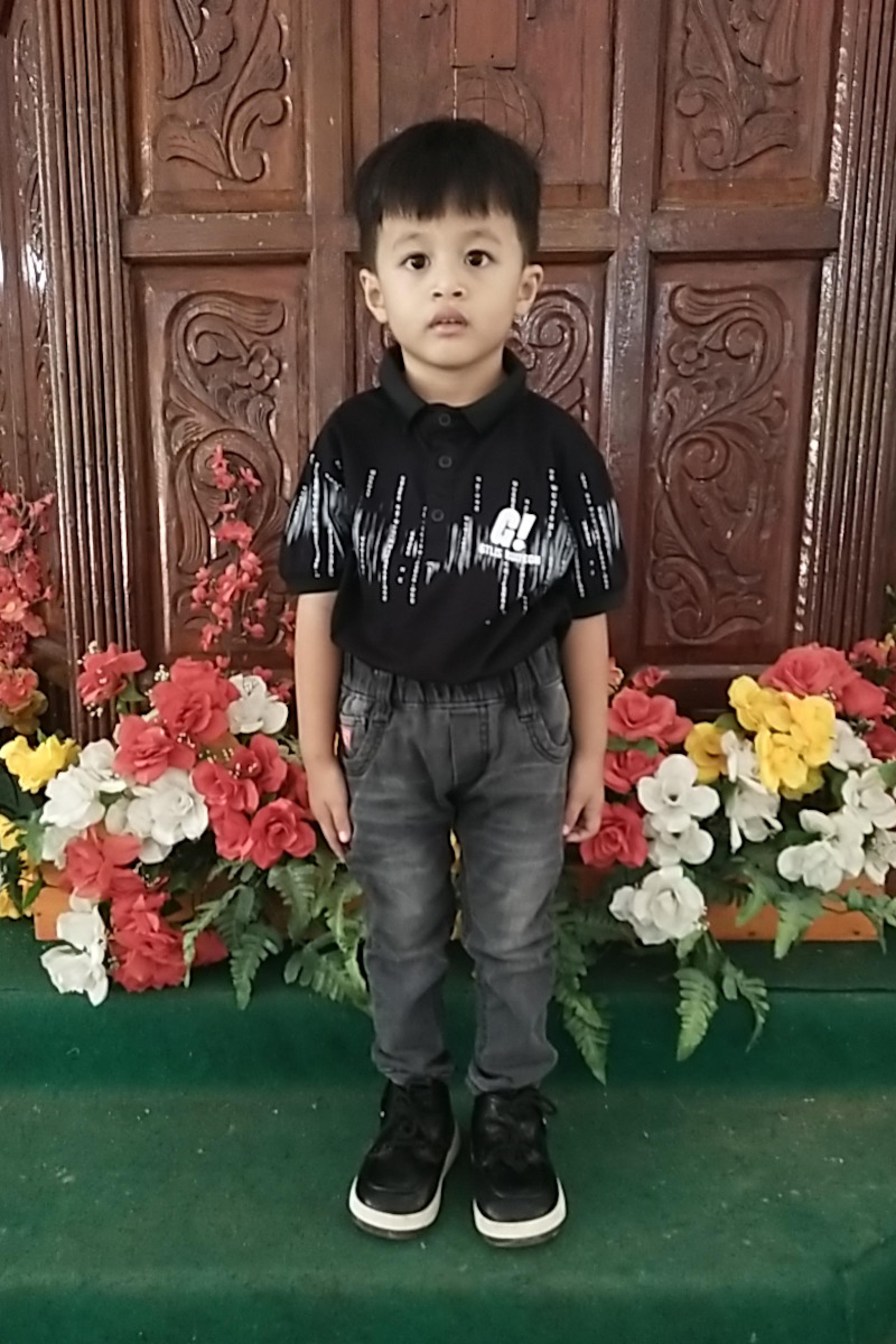An unsponsored boy named March from Indonesia who has waited 562 days for a sponsor.