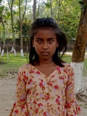 An unsponsored girl named Tusti from Bangladesh who is vulnerable to exploitation and has waited 499 days for a sponsor