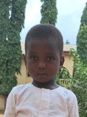 An unsponsored boy named Kwasi from Ghana who lives in an AIDS-affected area and has waited 504 days for a sponsor