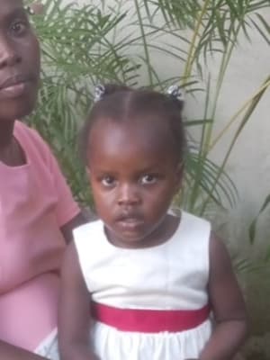 An unsponsored girl named Lydie from Haiti who is vulnerable to exploitation and has waited 541 days for a sponsor