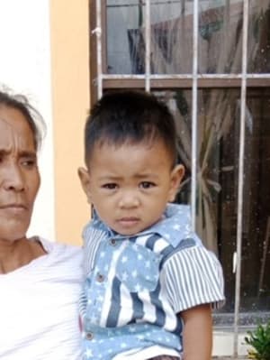 An unsponsored boy named Asyong from Philippines who has waited 548 days for a sponsor