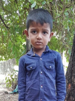 An unsponsored boy named Kavin from Sri Lanka who has waited 512 days for a sponsor
